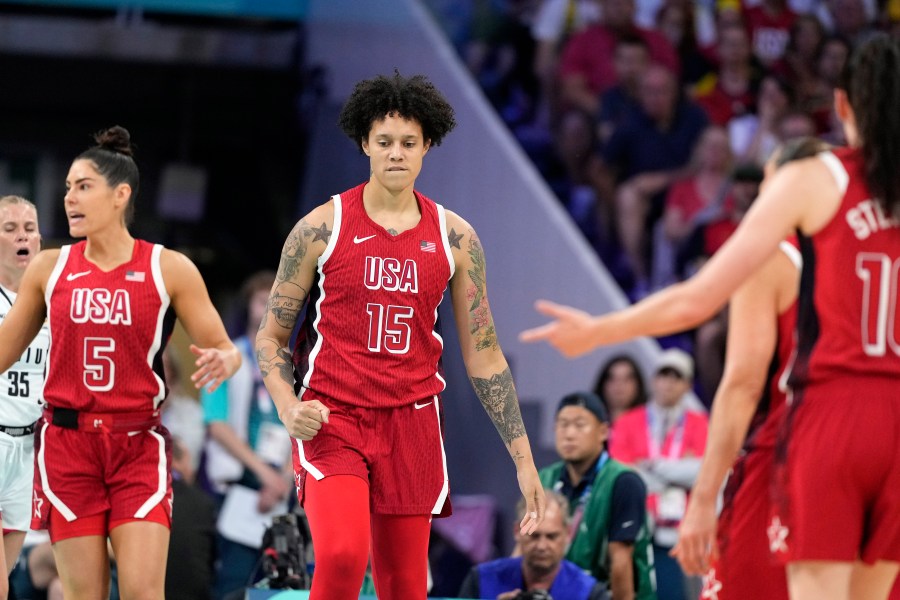 United States' Brittney Griner, center, reacts after being fouled during a women's basketball game against Belgium at the 2024 Summer Olympics, Thursday, Aug. 1, 2024, in Villeneuve-d'Ascq, France. (AP Photo/Michael Conroy)