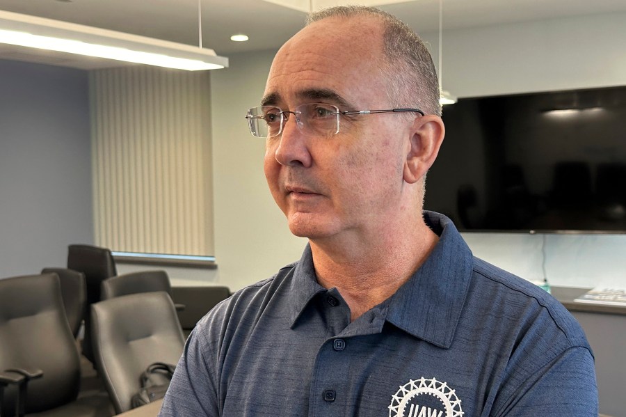 United Auto Workers President Shawn Fain speaks during an interview with The Associated Press on Friday, Aug. 2, 2024, in Detroit. (AP Photo/Mike Householder)