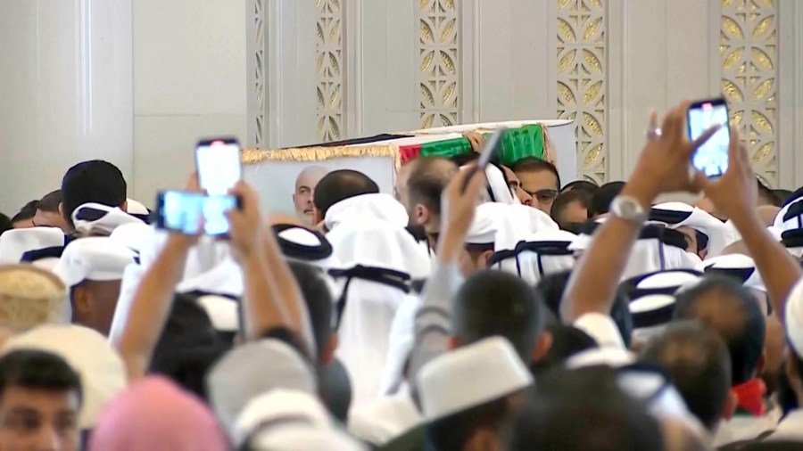 This video grab shows Hamas leader Ismail Haniyeh's coffin being carried out after the funeral prayers in Doha, Qatar, Friday Aug. 2, 2024. (Qatar TV via AP)