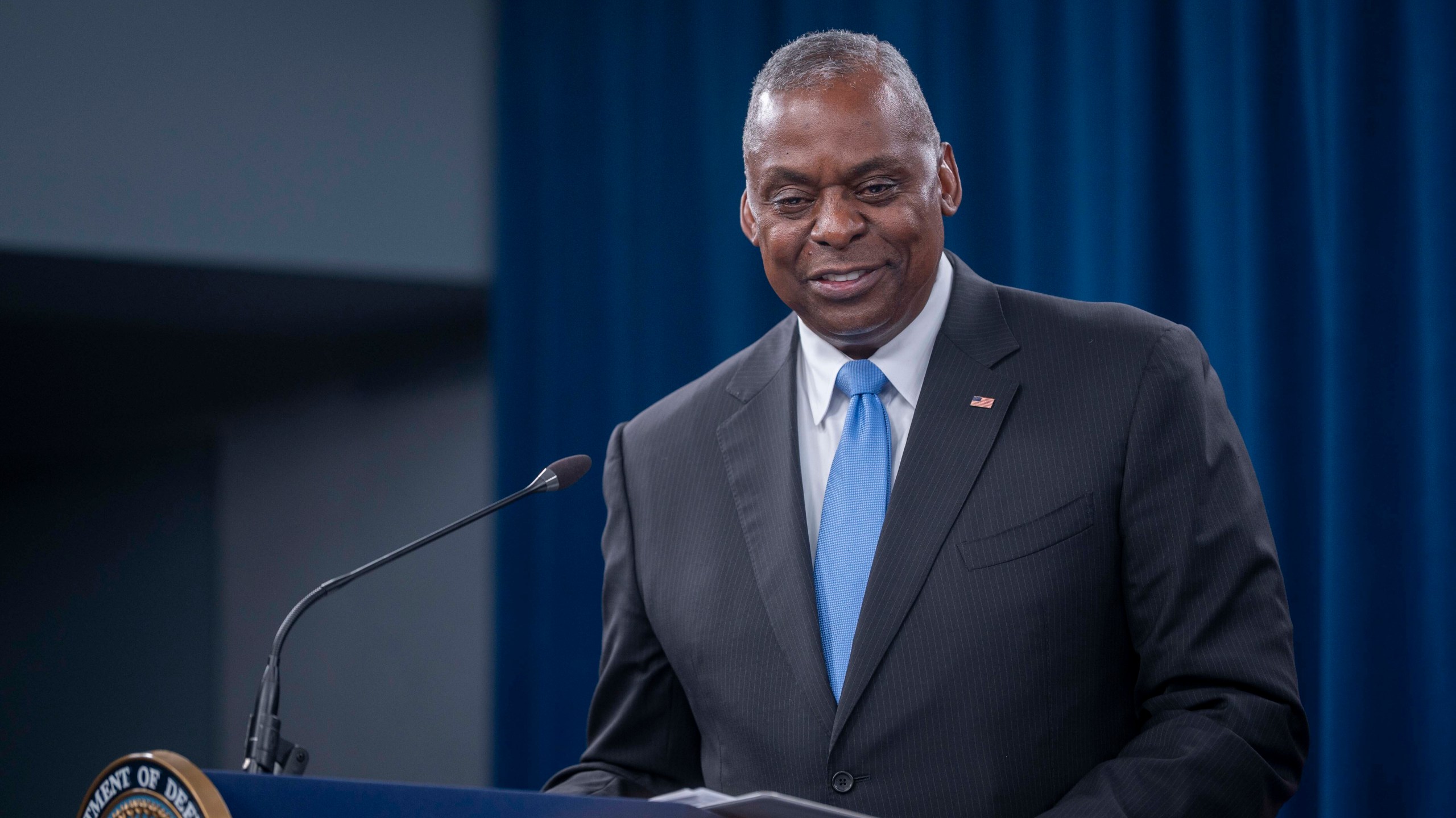 Secretary of Defense Lloyd Austin smiles while answering a question during a press briefing at the Pentagon on Thursday, July 25, 2024 in Washington. (AP Photo/Kevin Wolf)