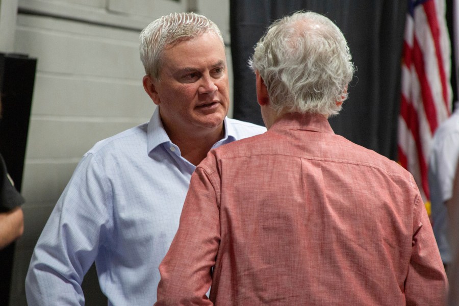 Republican Senate leader Mitch McConnell, right, and U.S. Rep. James Comer chat during a Republican breakfast on Saturday, Aug. 3, 2024, at Mayfield, Ky, before the annual Fancy Farm picnic. (Dylan Payne/The Paducah Sun via AP)