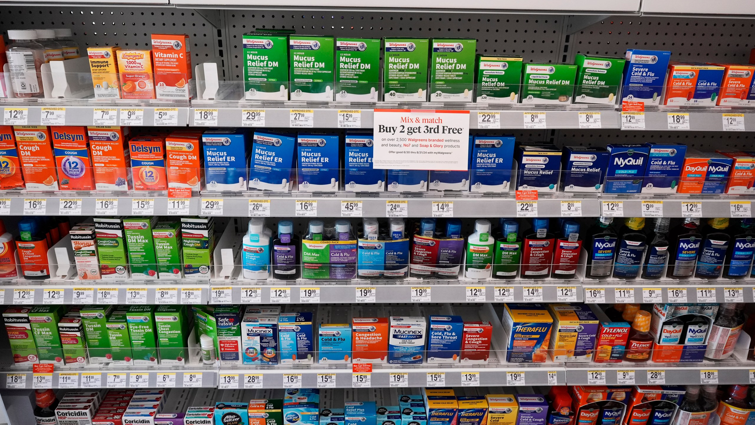 Medications are displayed on shelves at a Walgreens pharmacy store in Deerfield, Ill., Thursday, July 25, 2024. (AP Photo/Nam Y. Huh)