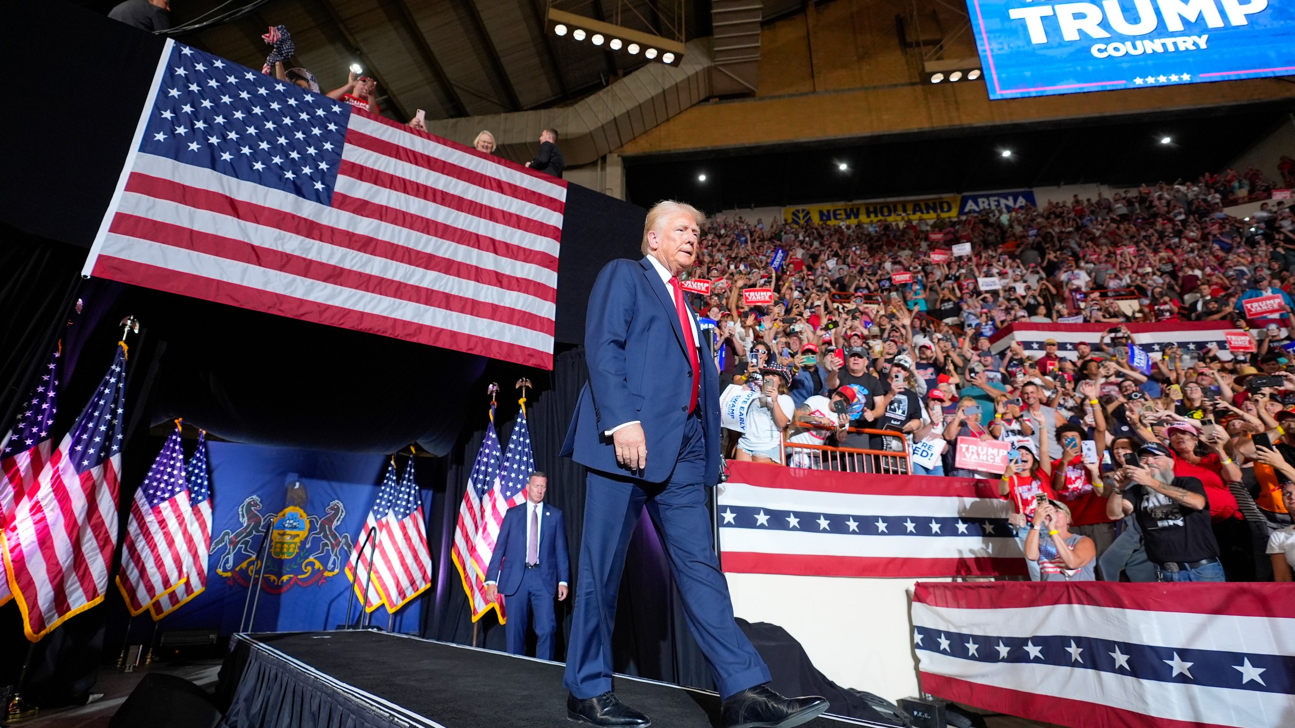 FILE - Republican presidential candidate former President Donald Trump arrives to speak at a campaign rally, July 31, 2024, in Harrisburg, Pa. Facing the need to win Pennsylvania, Vice President Kamala Harris has sworn off any prior assertion that she opposed fracking. But that hasn't stopped Trump from wielding her now-abandoned position as to win over working-class voters in the key battleground state where the industry means jobs. (AP Photo/Alex Brandon, File)