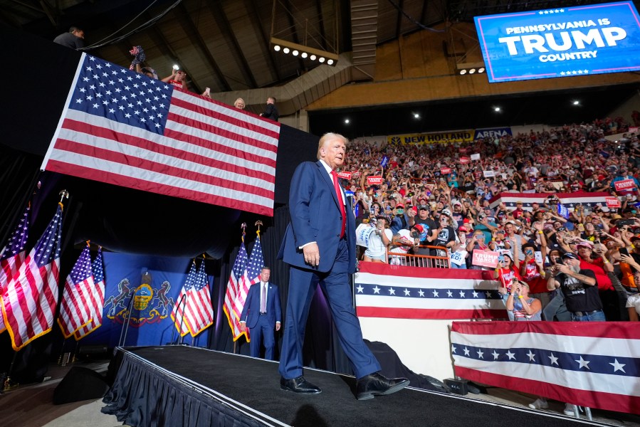 FILE - Republican presidential candidate former President Donald Trump arrives to speak at a campaign rally, July 31, 2024, in Harrisburg, Pa. Facing the need to win Pennsylvania, Vice President Kamala Harris has sworn off any prior assertion that she opposed fracking. But that hasn't stopped Trump from wielding her now-abandoned position as to win over working-class voters in the key battleground state where the industry means jobs. (AP Photo/Alex Brandon, File)