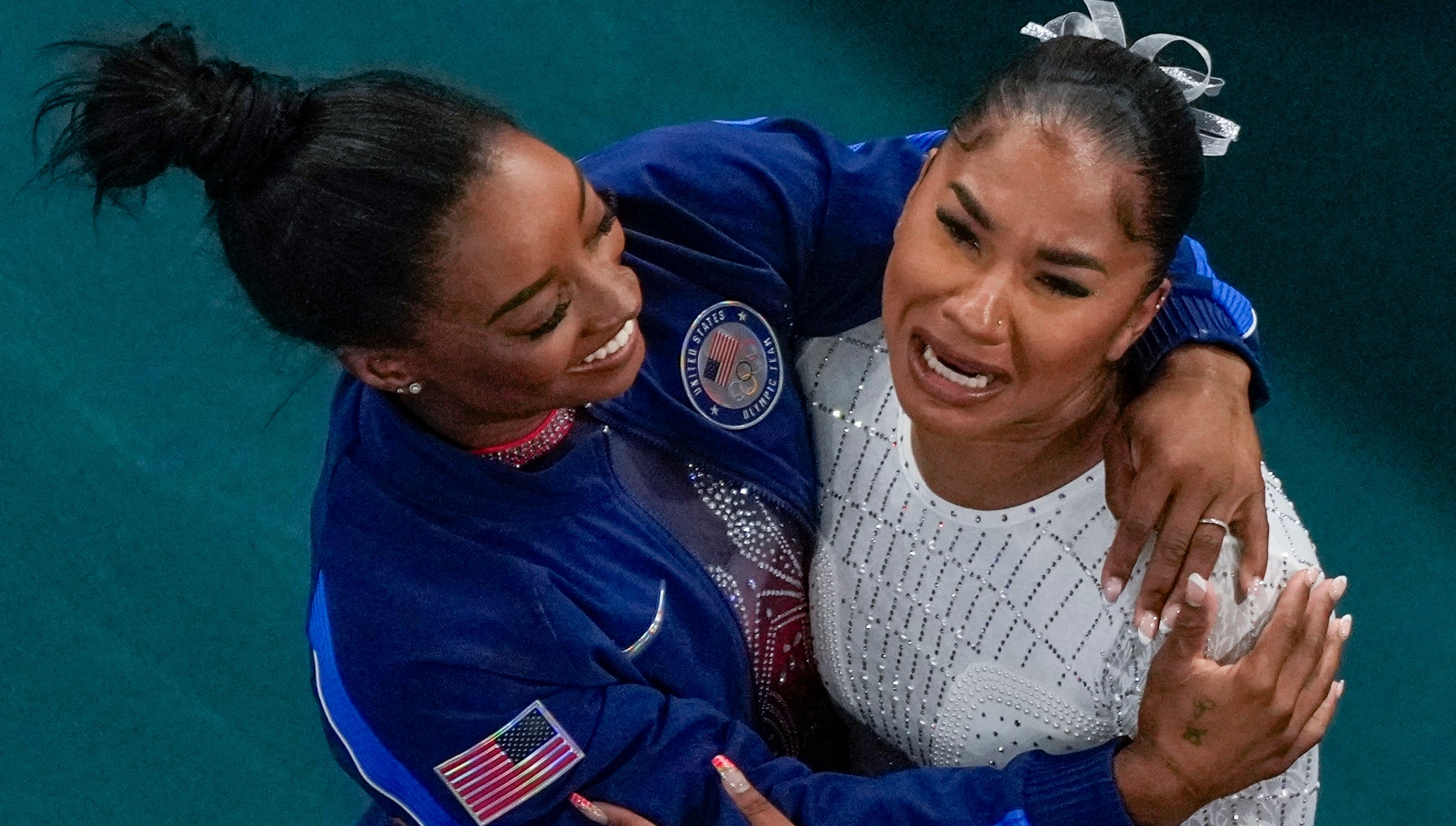 Jordan Chiles, of the United States, and Simone Biles, of the United States, celebrate after the women's artistic gymnastics individual floor finals in Bercy Arena at the 2024 Summer Olympics, Monday, Aug. 5, 2024, in Paris, France. Biles won the silver medal and Chiles the bronze medal. (AP Photo/Morry Gash)