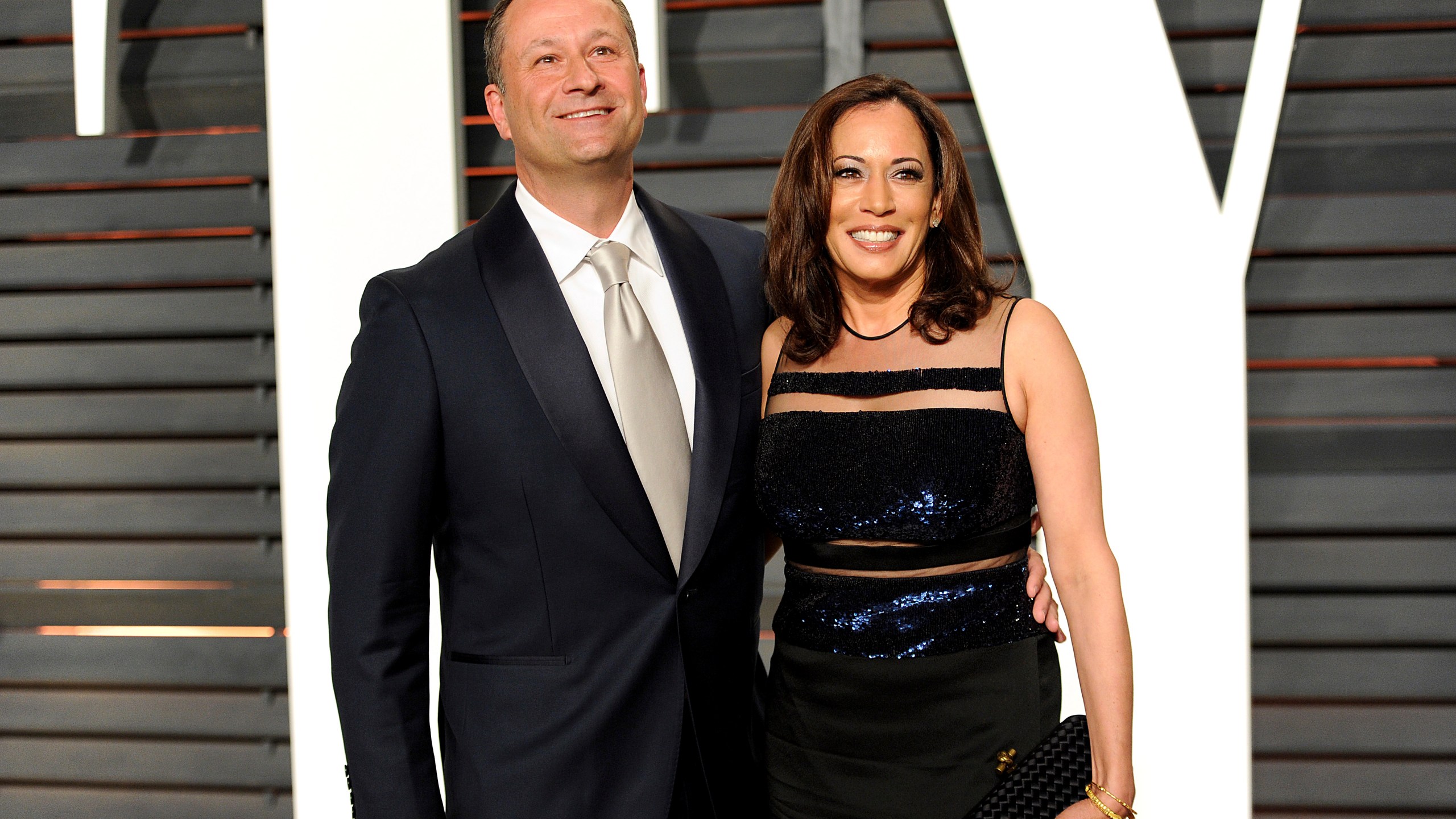 FILE - Attorney Douglas Emhoff, left, and California Attorney General Kamala Harris arrive at the Vanity Fair Oscar Party, Feb. 22, 2015, in Beverly Hills, Calif. Harris, the daughter of immigrants who rose through the California political and law enforcement ranks to become the first female vice president in U.S. history, is poised to secure the Democratic Party's presidential nomination Monday, Aug. 5, 2024. (Photo by Evan Agostini/Invision/AP, File)