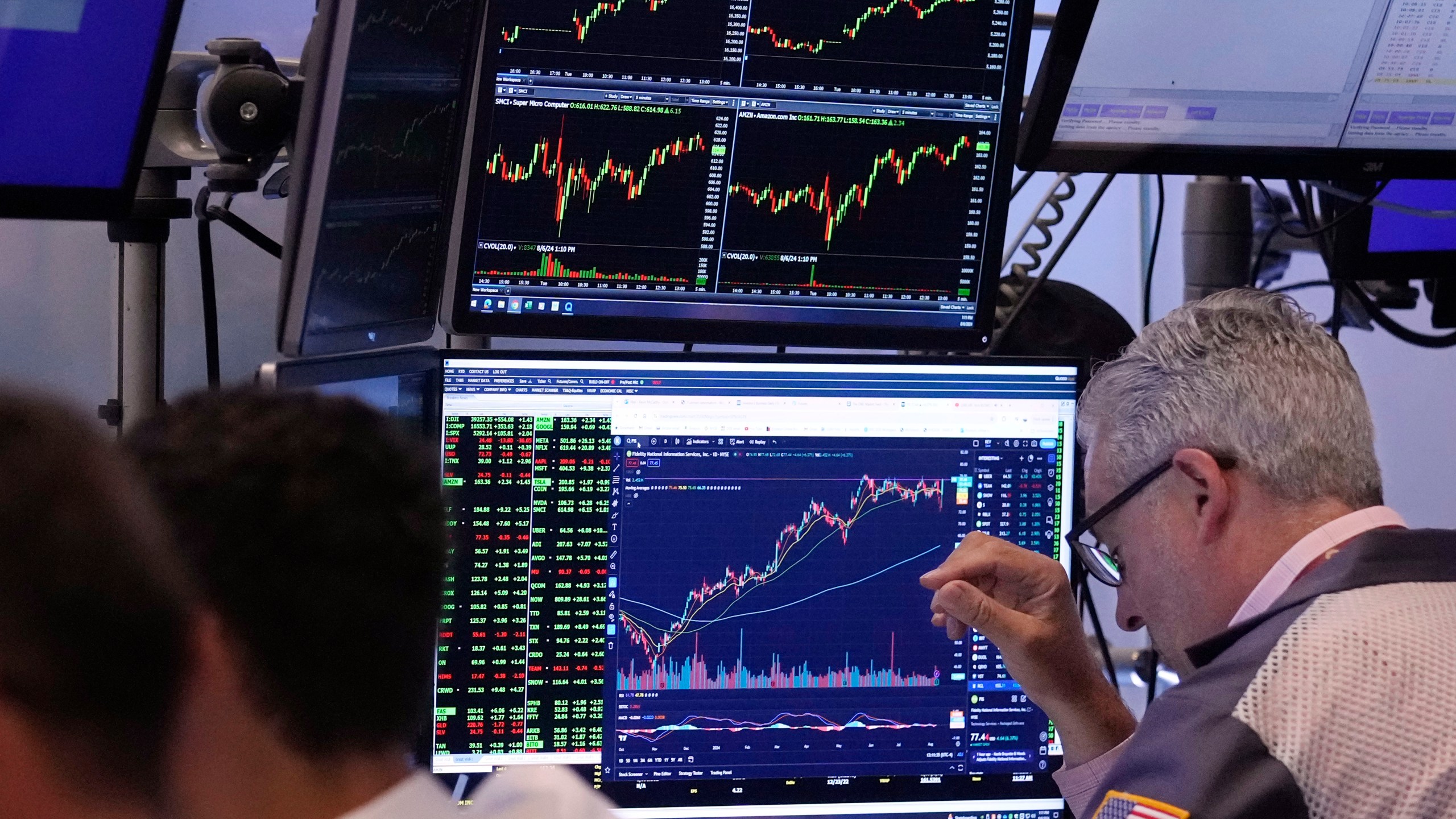 Traders work on the floor of the New York Stock Exchange, Tuesday, Aug. 6, 2024.(AP Photo/Richard Drew)