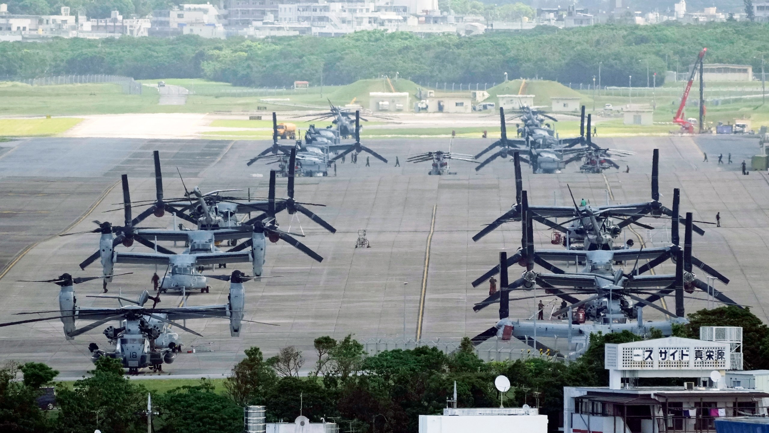 FILE - U.S. MV-22 Osprey transport aircraft are parked at the U.S. Marine Corps Air Station Futenma in Ginowan, south of Okinawa, southern Japan, Sept. 6, 2023. (AP Photo/Hiro Komae, File)