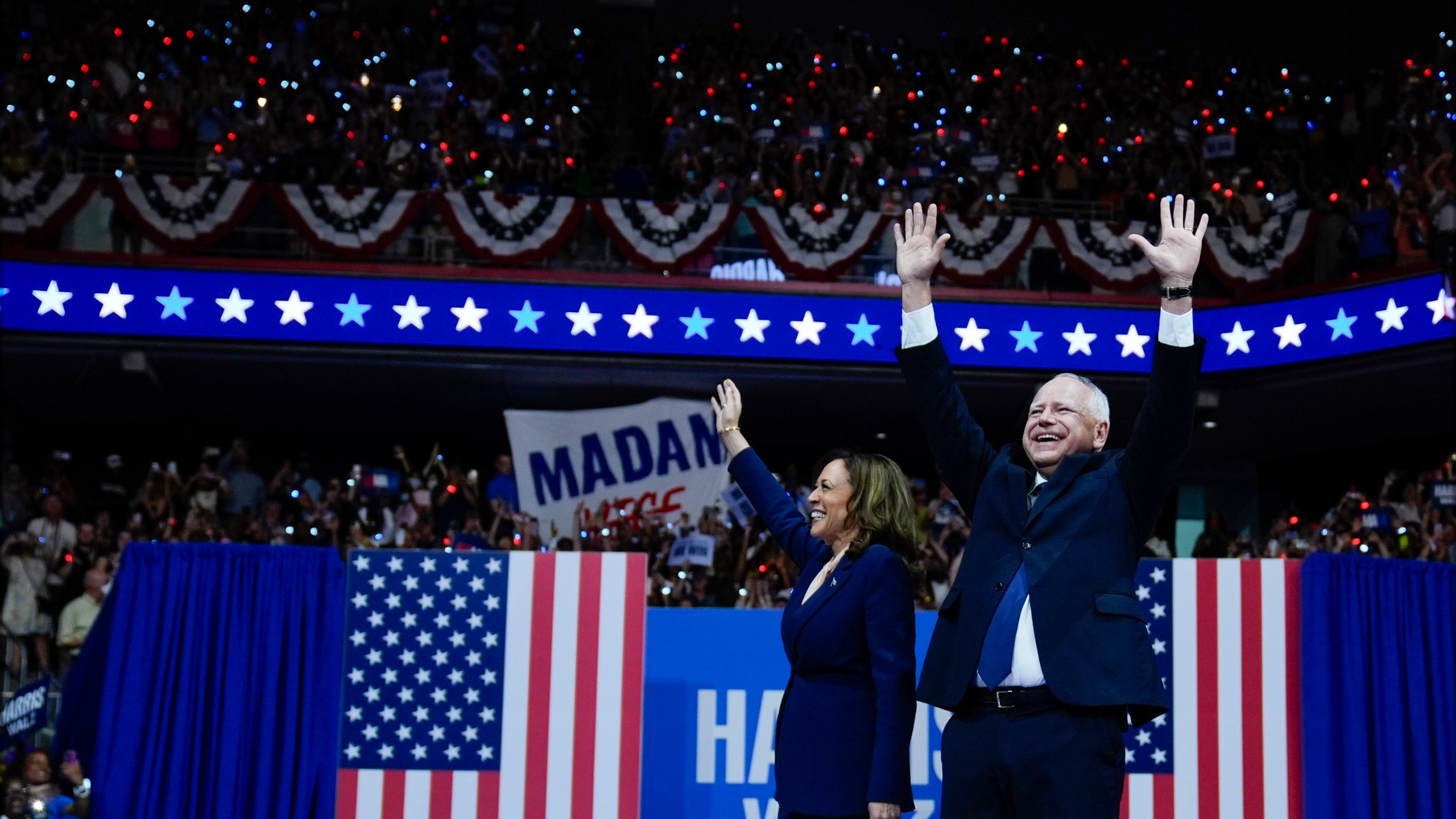 Democratic presidential nominee Vice President Kamala Harris and her running mate Minnesota Gov. Tim Walz arrive at a campaign rally in Philadelphia, Tuesday, Aug. 6, 2024. (AP Photo/Matt Rourke)