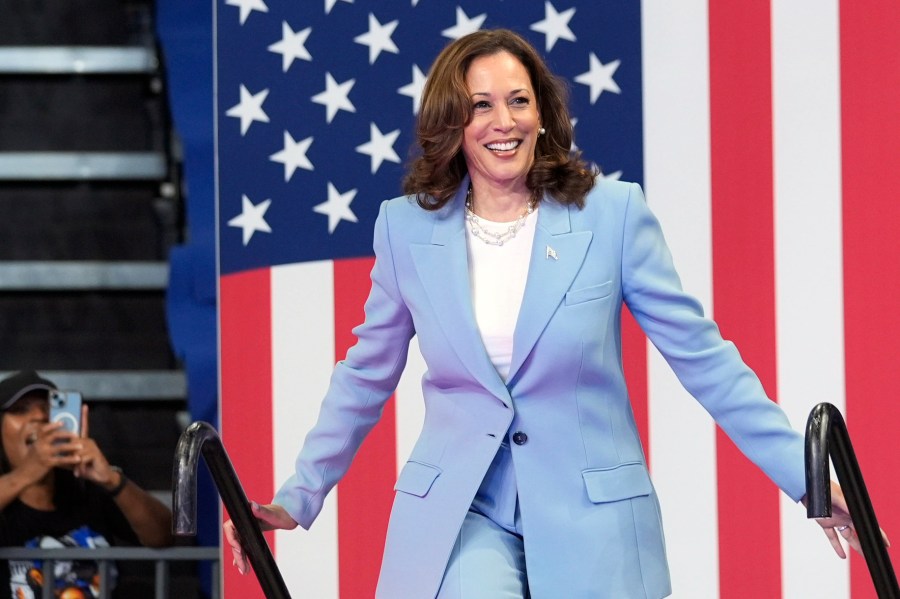 FILE - Vice President Kamala Harris arrives to speak during a campaign rally, July 30, 2024, in Atlanta. Harris, the daughter of immigrants who rose through the California political and law enforcement ranks to become the first female vice president in U.S. history, is poised to secure the Democratic Party's presidential nomination Monday, Aug. 5, 2024. (AP Photo/John Bazemore)