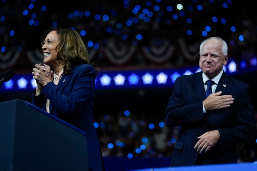 Democratic presidential nominee Vice President Kamala Harris and her running mate Minnesota Gov. Tim Walz speak at a campaign rally in Philadelphia, Tuesday, Aug. 6, 2024. (AP Photo/Matt Rourke)