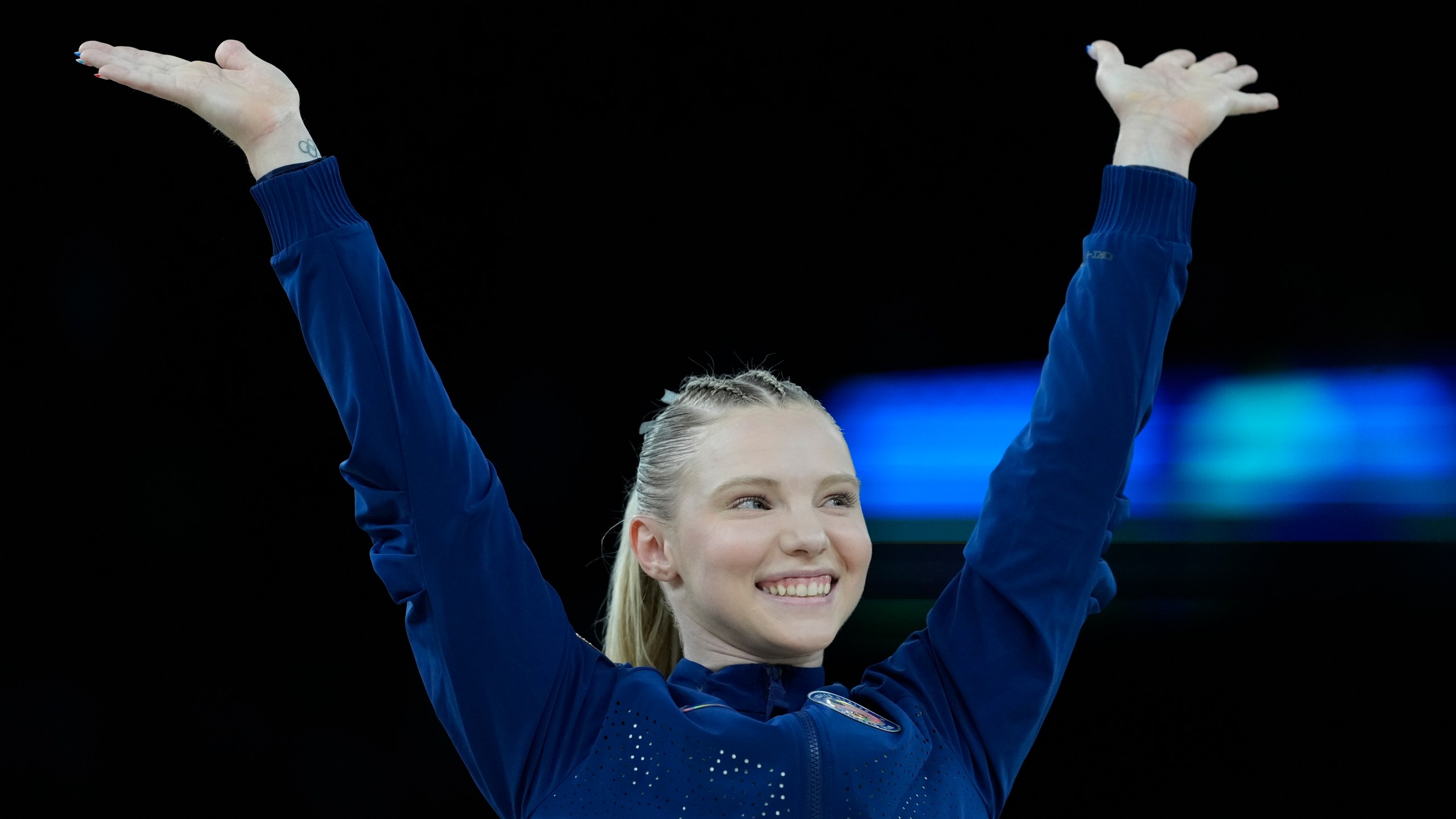 Jade Carey, of the United States, celebrates after winning the bronze medal during the medal ceremony after the women's artistic gymnastics individual vault finals at Bercy Arena at the 2024 Summer Olympics, Saturday, Aug. 3, 2024, in Paris, France. (AP Photo/Francisco Seco)