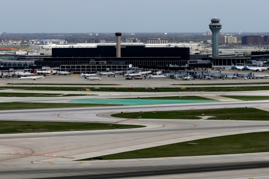 FILE - The O'Hare International Airport terminals are seen from the south air traffic control tower in Chicago, April 22, 2019. (AP Photo/Kiichiro Sato, File)