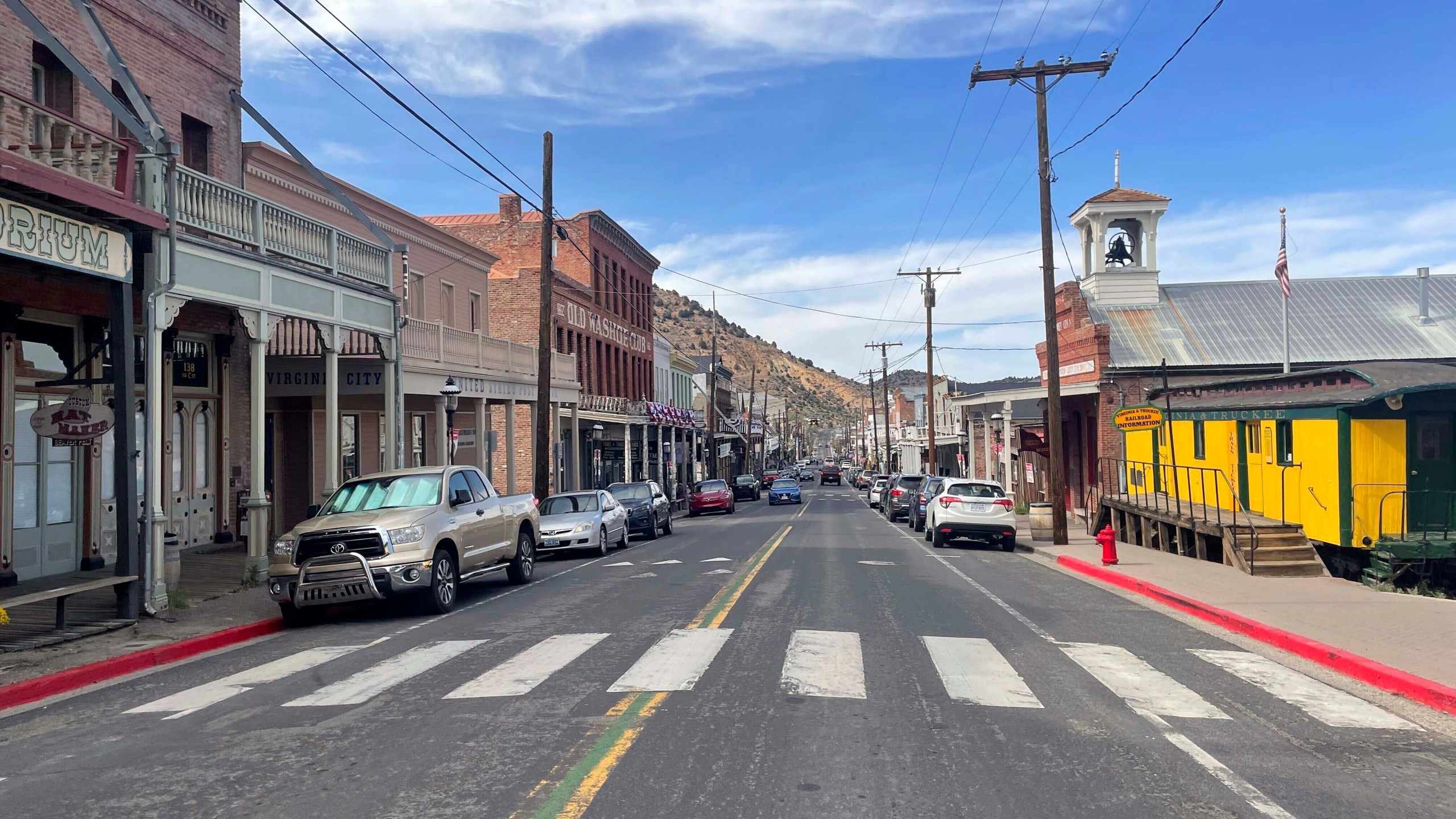 FILE - Cars line the main stretch of Virginia City, Nev., that attracts tens of thousands of tourists. (AP Photo/Gabe Stern, File)