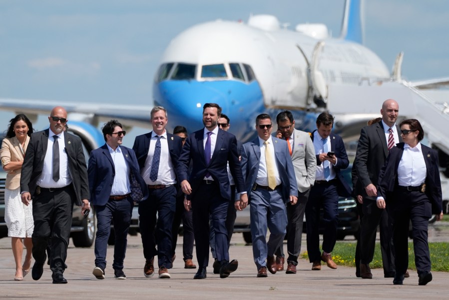 Republican vice presidential nominee Sen. JD Vance, R-Ohio, walks back from looking at Air Force Two at Chippewa Valley Regional Airport, Wednesday, Aug. 7, 2024, in Eau Claire, Wis. (AP Photo/Alex Brandon)