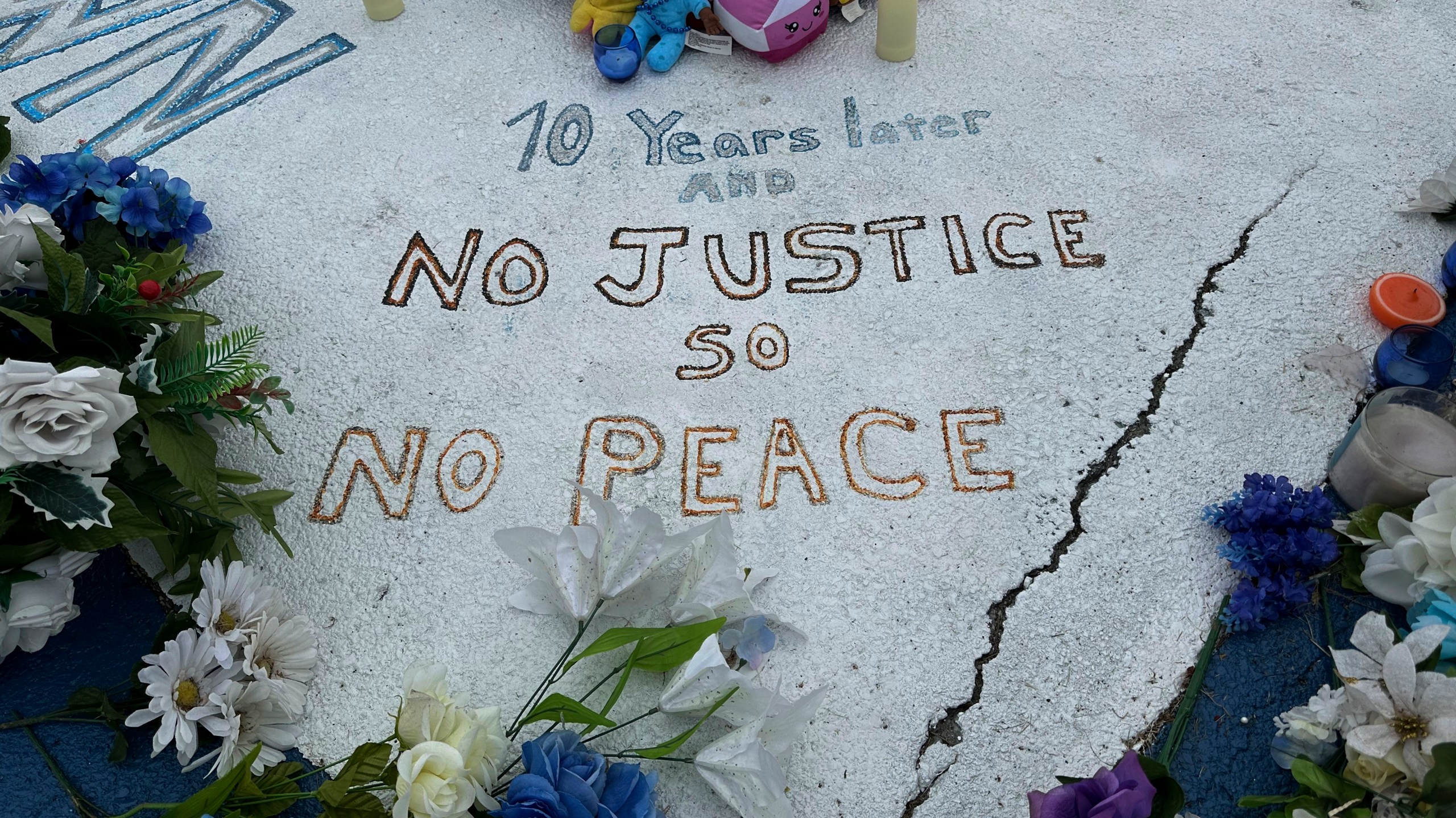 A memorial to Michael Brown is displayed on Canfield Drive in Ferguson, Mo., on Wednesday, Aug. 7, 2024. (AP Photo/Jim Salter)