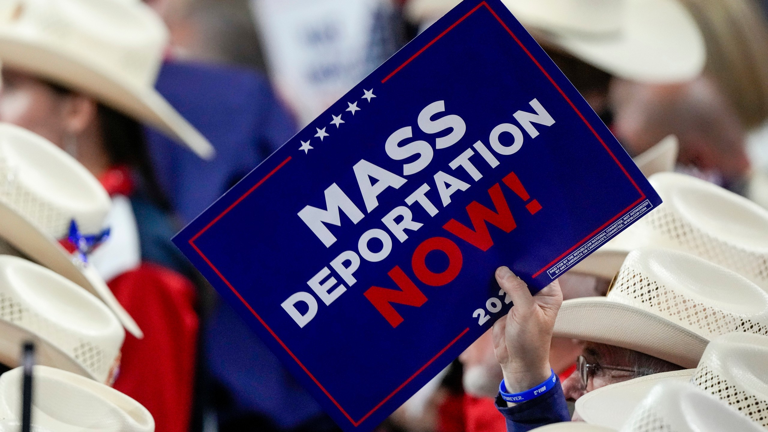 FILE - A member of the Texas delegation holds a sign during the Republican National Convention July 17, 2024, in Milwaukee. (AP Photo/Matt Rourke, File)