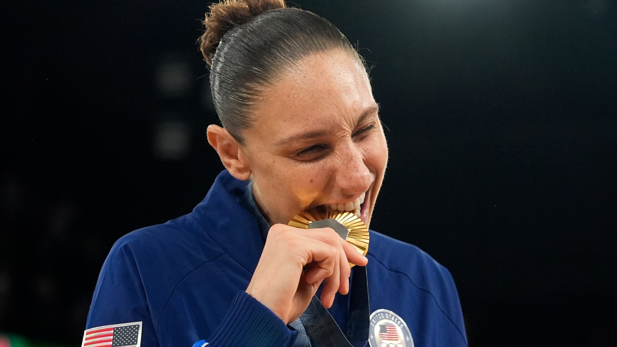 United States' Diana Taurasi reacts after winning her sixth gold medal at Bercy Arena at the 2024 Summer Olympics, Sunday, Aug. 11, 2024, in Paris, France. (AP Photo/Mark J. Terrill)