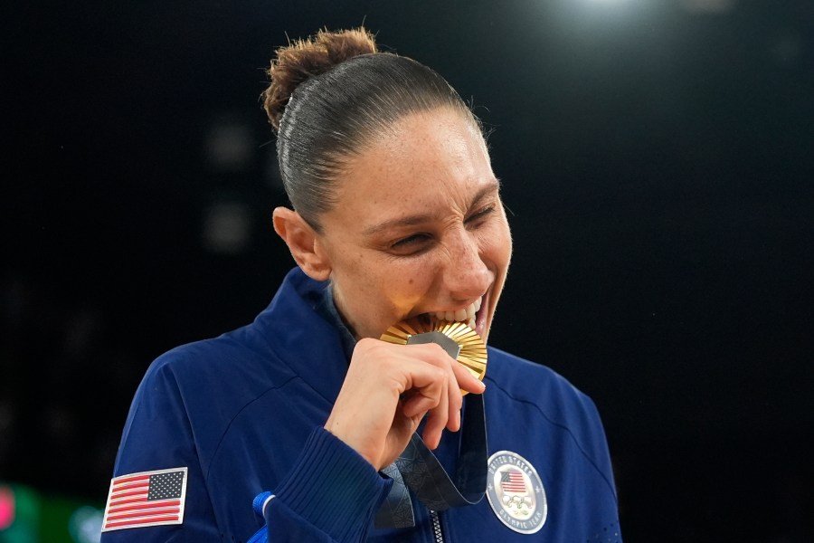 United States' Diana Taurasi reacts after winning her sixth gold medal at Bercy Arena at the 2024 Summer Olympics, Sunday, Aug. 11, 2024, in Paris, France. (AP Photo/Mark J. Terrill)