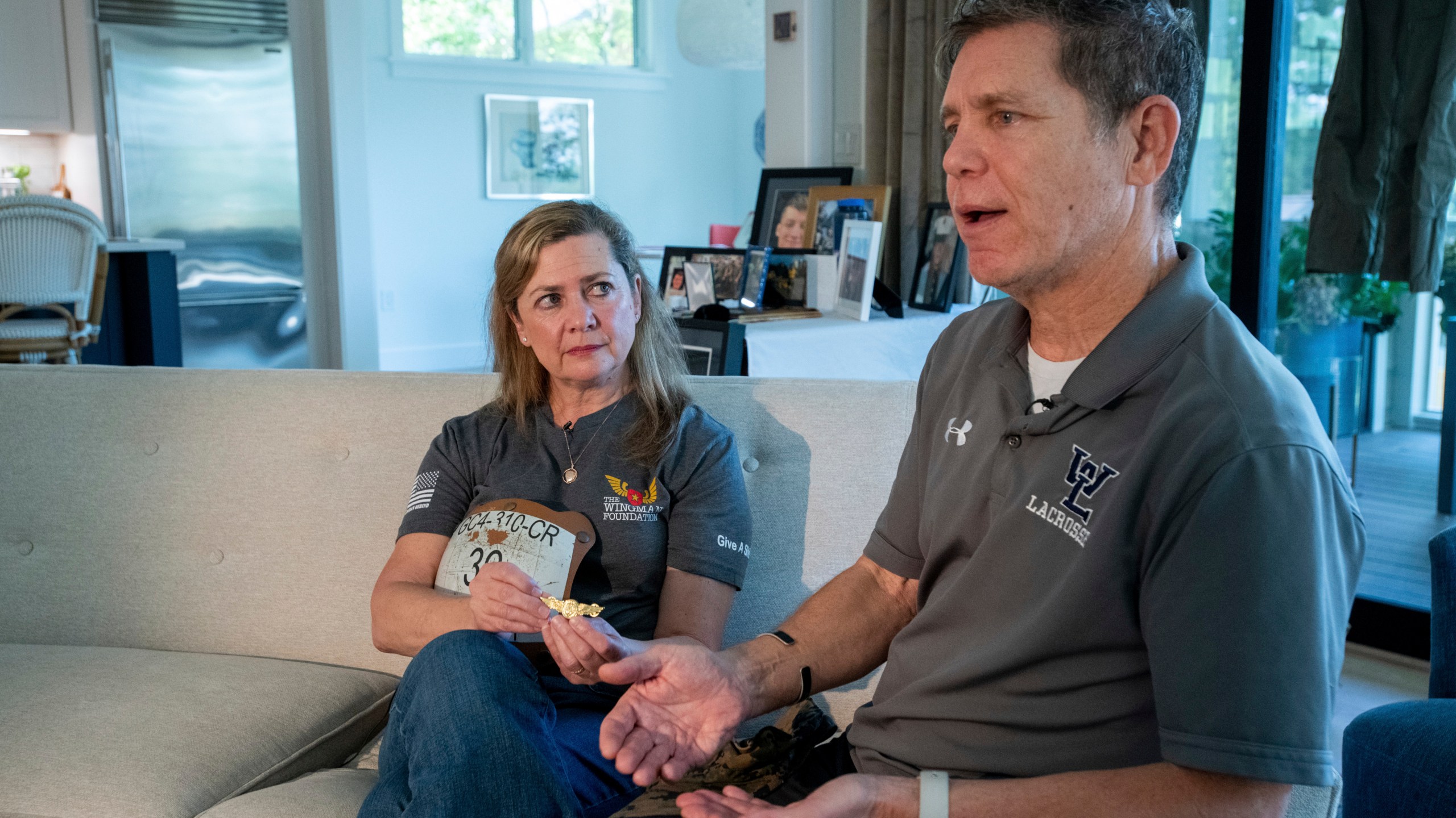 Bart Collart, right, and his wife Alexia Collart, talk about their son, Marine Corporal Spencer R. Collart, at their home, in Arlington, Va., Thursday, June 19, 2024. Their son was killed along with two other Marines when the MV-22B Osprey aircraft they were on crashed during drills on a north Australian island on August 27, 2023. (AP Photo/Rod Lamkey, Jr.)