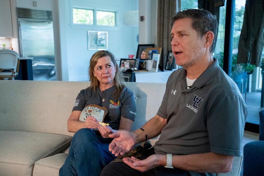 Bart Collart, right, and his wife Alexia Collart, talk about their son, Marine Corporal Spencer R. Collart, at their home, in Arlington, Va., Thursday, June 19, 2024. Their son was killed along with two other Marines when the MV-22B Osprey aircraft they were on crashed during drills on a north Australian island on August 27, 2023. (AP Photo/Rod Lamkey, Jr.)