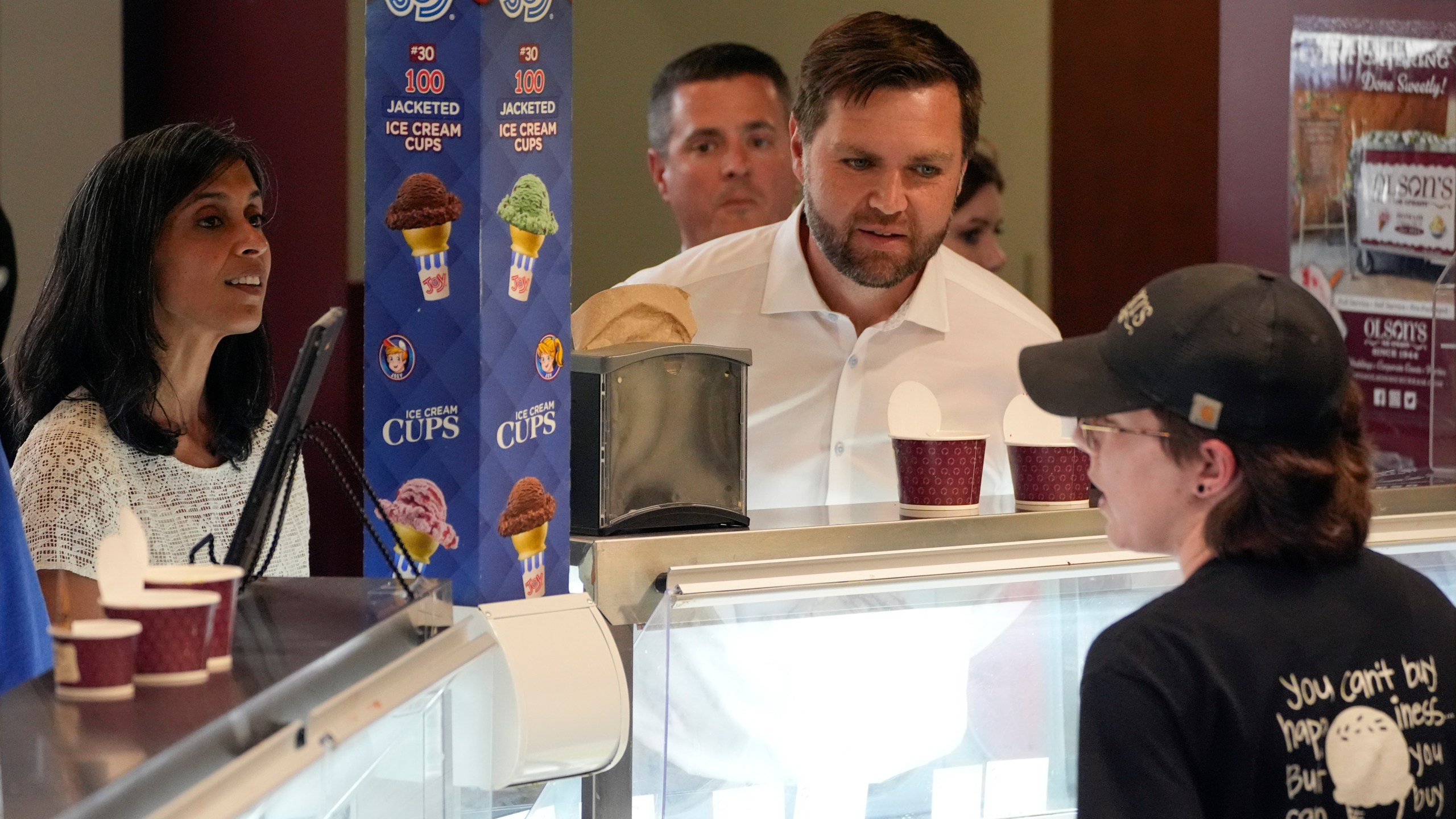 Republican vice presidential nominee Sen. JD Vance, R-Ohio, and his wife Usha Chilukuri Vance order ice cream at Olson's Ice Cream Wednesday, Aug. 7, 2024, in Eau Claire, Wis. (AP Photo/Alex Brandon)