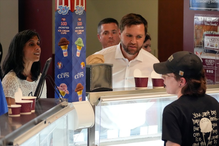 Republican vice presidential nominee Sen. JD Vance, R-Ohio, and his wife Usha Chilukuri Vance order ice cream at Olson's Ice Cream Wednesday, Aug. 7, 2024, in Eau Claire, Wis. (AP Photo/Alex Brandon)