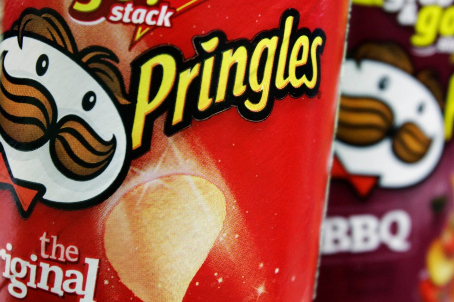 FILE - In this April 5, 2011 file photo, Pringles chips are seen in a posed photo at a West Bath, Maine grocery store. (AP Photo/Pat Wellenbach, File)