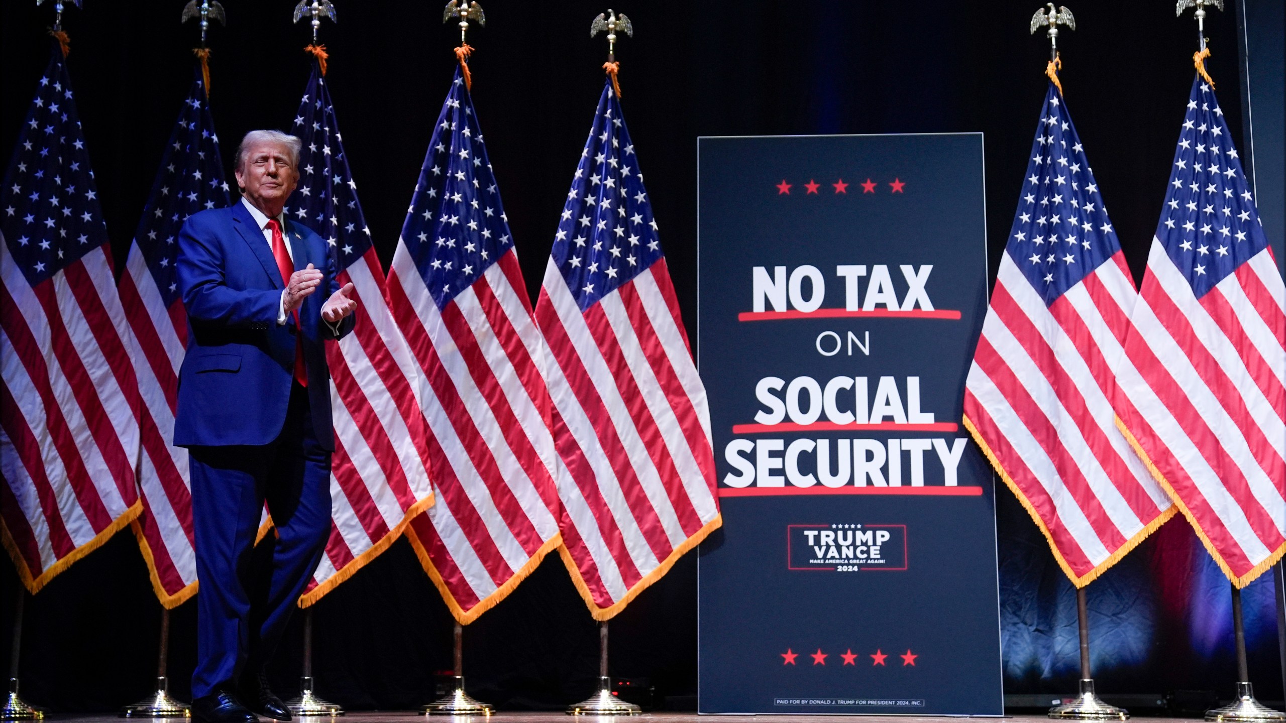 Republican presidential nominee former President Donald Trump arrives to speak at a campaign rally in Asheville, N.C., Wednesday, Aug. 14, 2024. (AP Photo/Matt Rourke)