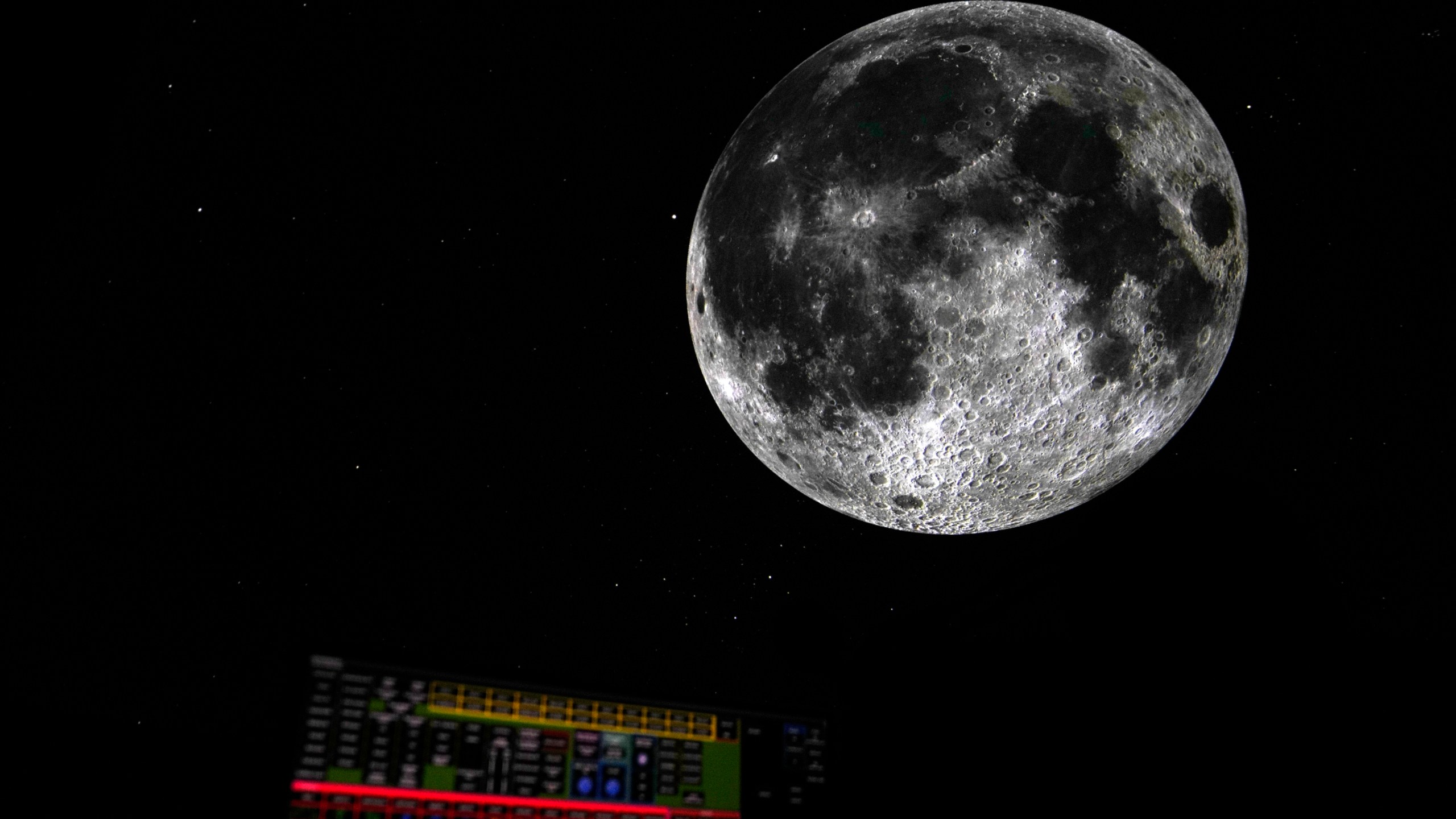 An image of the moon is projected at the Iziko Planetarium in Cape Town, South Africa, Tuesday, Aug. 13, 2024 as part of the World Astronomy Conference. (AP Photo/Nardus Engelbrecht)