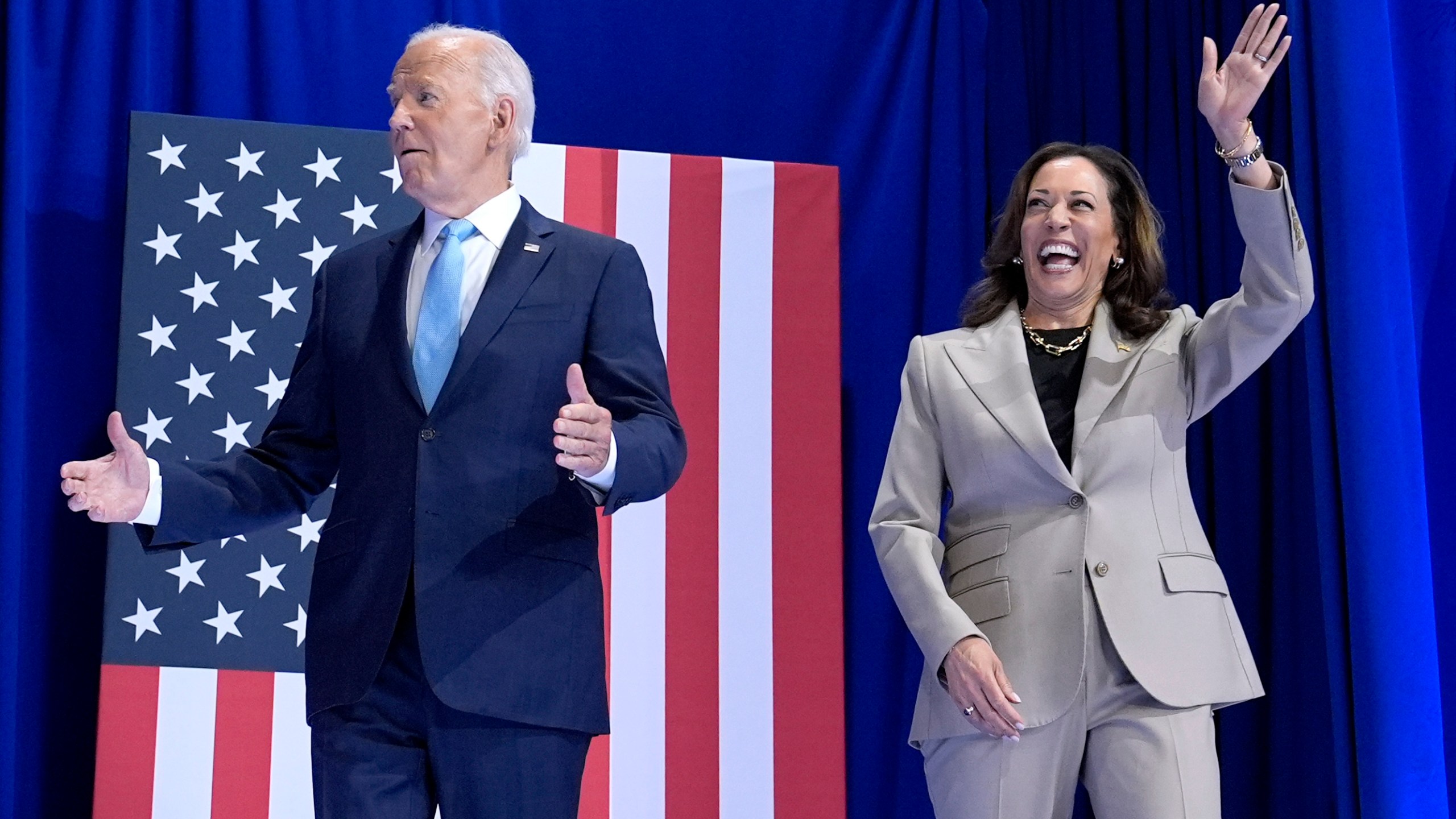 President Joe Biden, left, and Democratic presidential nominee Vice President Kamala Harris arrive to speak about the administration's efforts to lower costs during an event at Prince George's Community College in Largo, Md., Thursday, Aug. 15, 2024. (AP Photo/Susan Walsh)