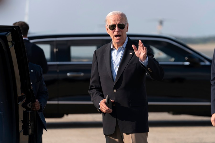 President Joe Biden talks to reporters upon his arrival to Joint Base Andrews, Md., en route to the White House, Sunday, Aug. 18, 2024. (AP Photo/Jose Luis Magana)