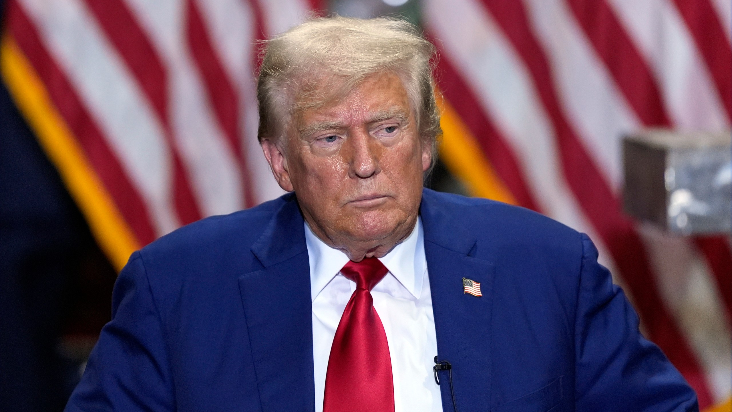 Republican presidential nominee former President Donald Trump listens at a business roundtable discussion at a campaign event at Precision Components Group, Monday, Aug. 19, 2024, in York, Pa. (AP Photo/Julia Nikhinson)