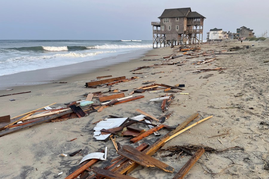 This photo provided by the National Park Service on Friday, Aug. 16, 2024, in Rodanthe, N.C., along the Cape Hatteras National Seashore shows debris from an unoccupied beach house that collapsed into the Atlantic Ocean from winds and waves caused by Hurricane Ernesto. (Cape Hatteras National Seashore via AP)