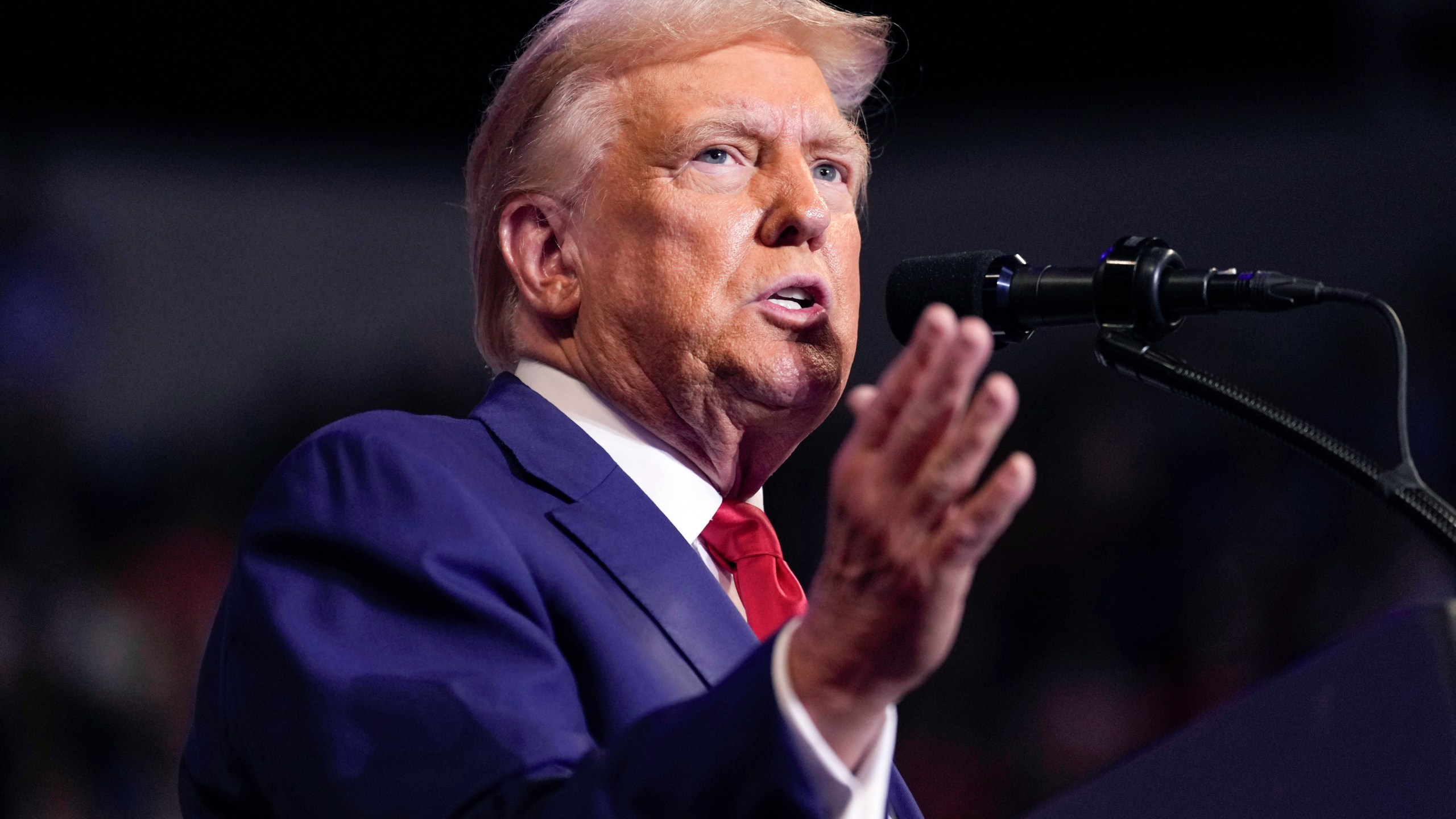 FILE - Republican presidential nominee former President Donald Trump speaks at a campaign rally at the Mohegan Sun Arena at Casey Plaza, Aug. 17, 2024, in Wilkes-Barre, Pa. Trump, aided by images generated by artificial intelligence, accepted an endorsement from Taylor Swift that he never actually received. (AP Photo/Carolyn Kaster)