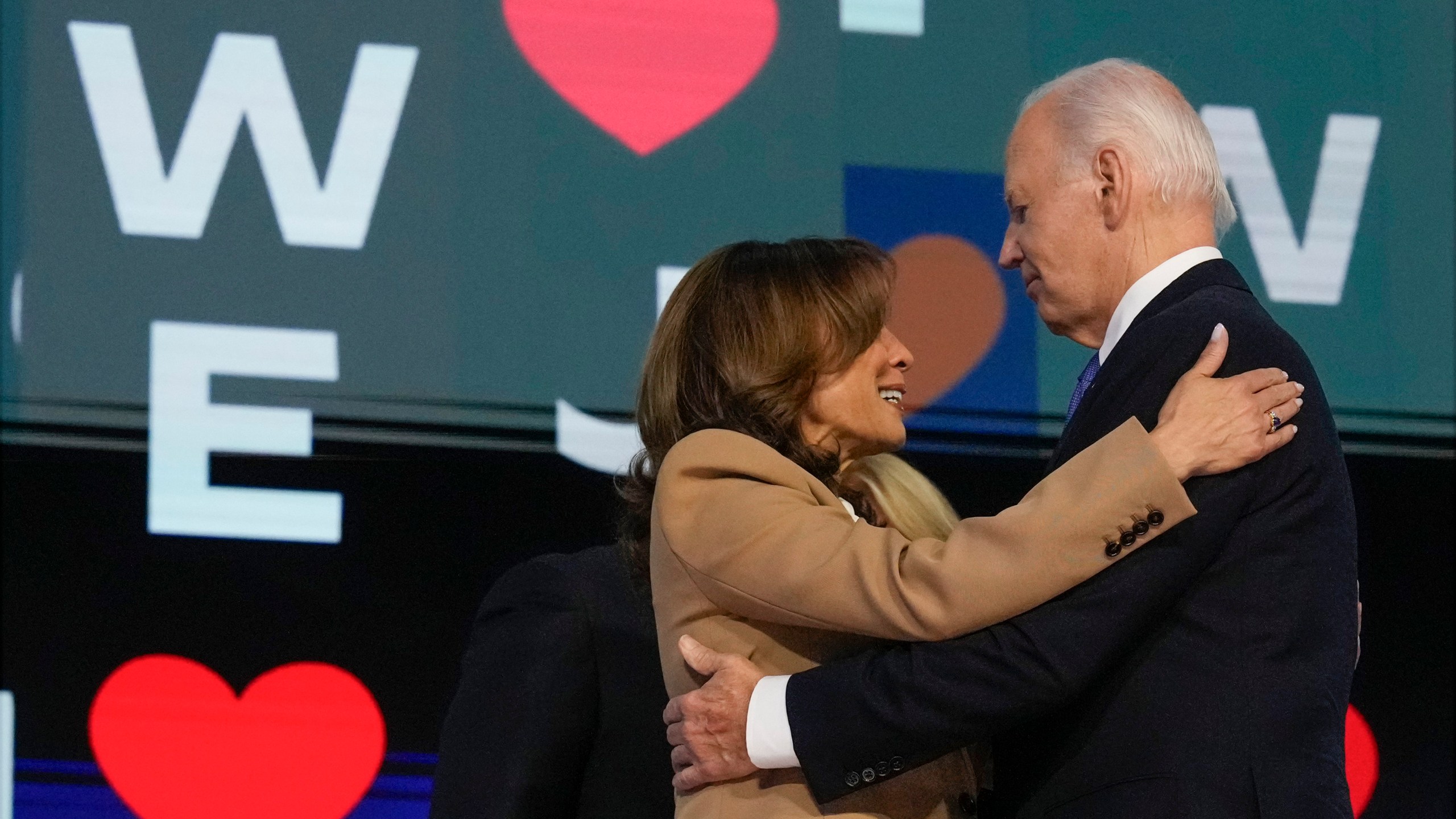 President Joe Biden embraces Democratic presidential nominee Vice President Kamala Harris during the first day of Democratic National Convention, Monday, Aug. 19, 2024, in Chicago. (AP Photo/Jacquelyn Martin)