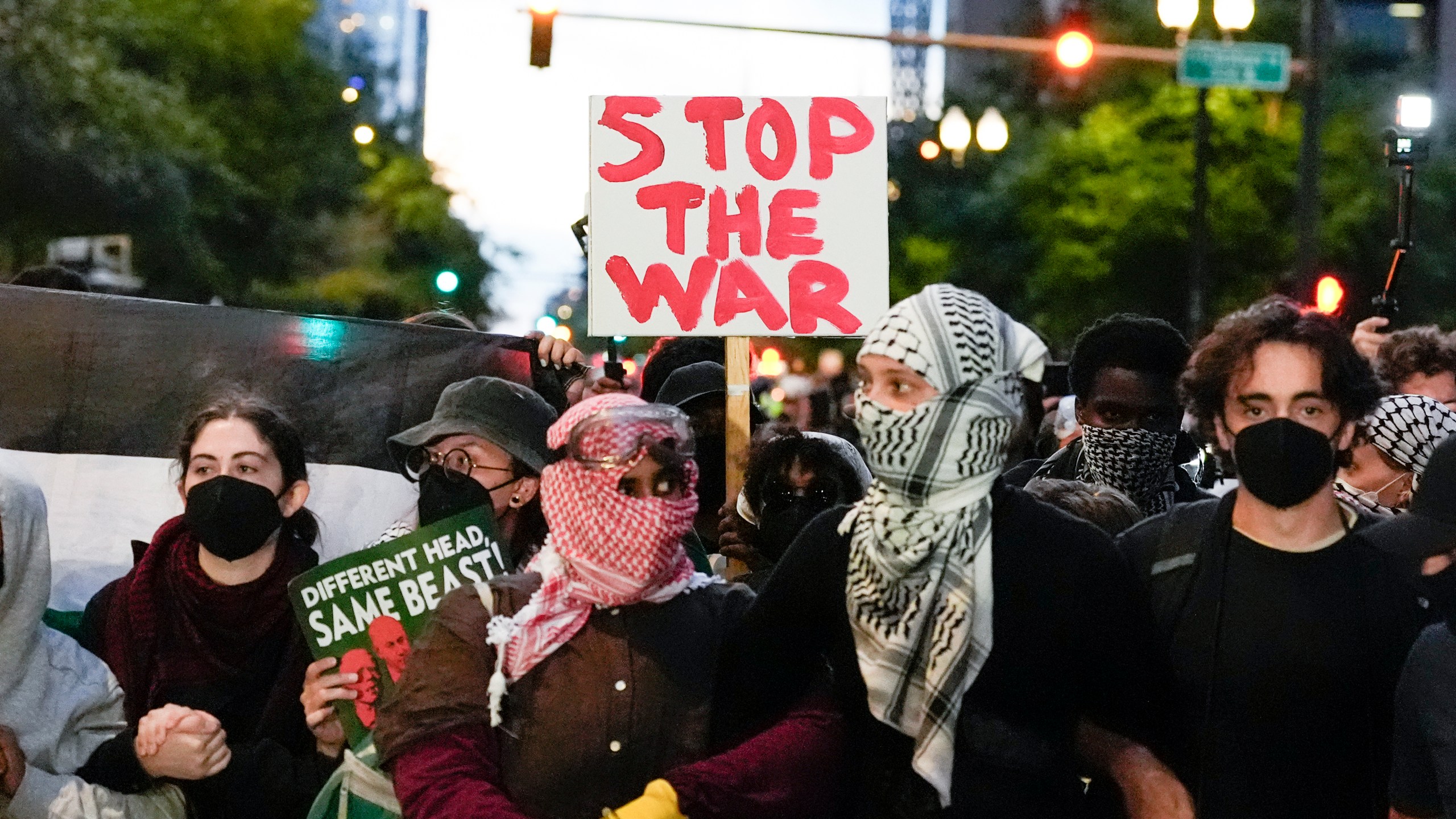 Protesters demonstrate near the Israeli Consulate during the Democratic National Convention Tuesday, Aug. 20, 2024, in Chicago. (AP Photo/Alex Brandon)