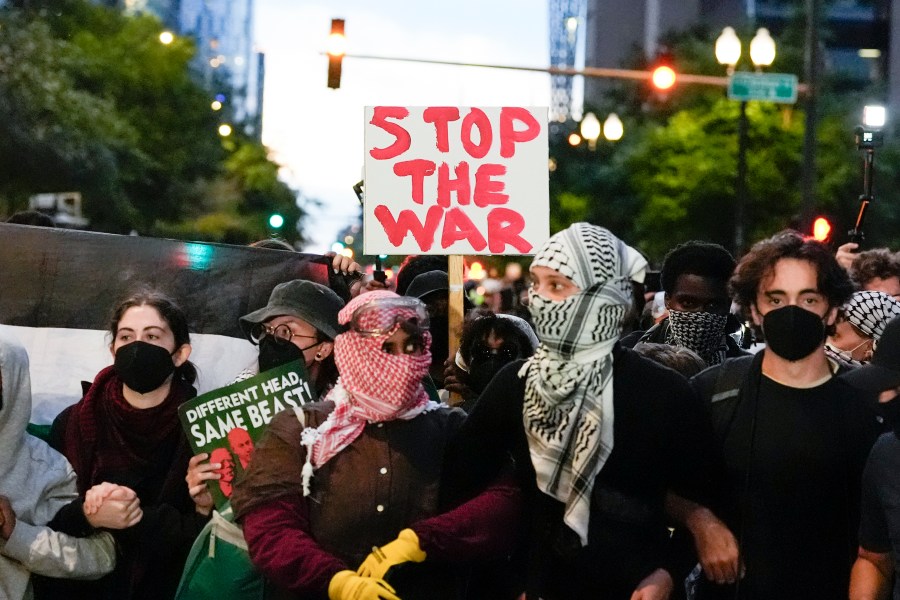 Protesters demonstrate near the Israeli Consulate during the Democratic National Convention Tuesday, Aug. 20, 2024, in Chicago. (AP Photo/Alex Brandon)