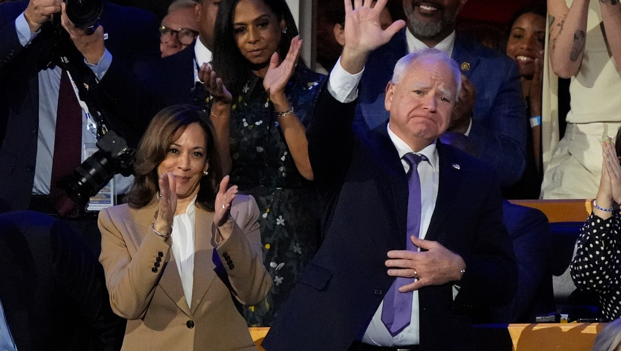 Democratic presidential nominee Vice President Kamala Harris and Democratic vice presidential nominee Minnesota Gov. Tim Walz during the Democratic National Convention Monday, Aug. 19, 2024, in Chicago. (AP Photo/Charles Rex Arbogast)