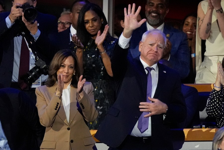 Democratic presidential nominee Vice President Kamala Harris and Democratic vice presidential nominee Minnesota Gov. Tim Walz during the Democratic National Convention Monday, Aug. 19, 2024, in Chicago. (AP Photo/Charles Rex Arbogast)