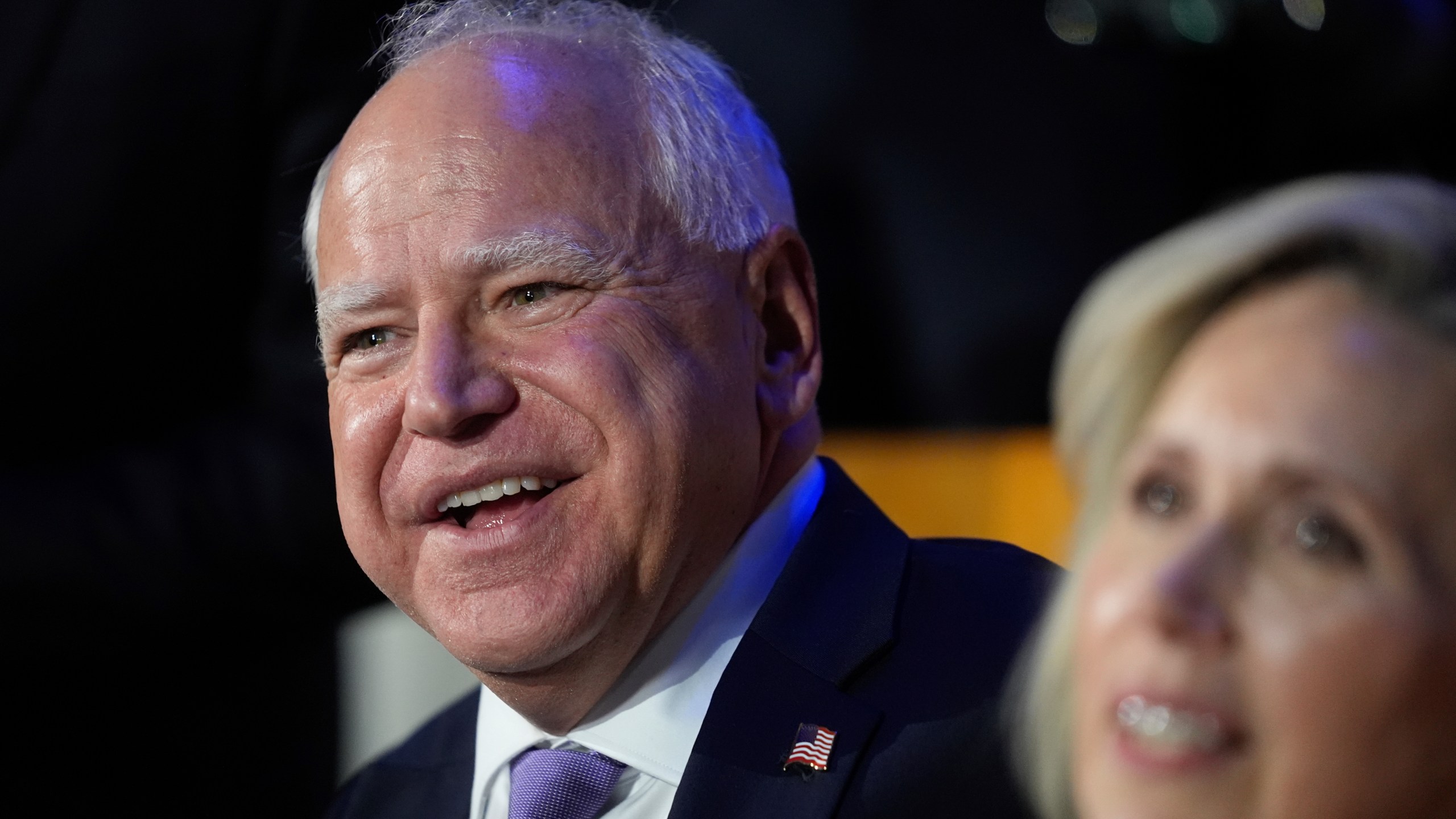 Democratic vice presidential nominee Minnesota Gov. Tim Walz and his wife Gwen Walz watch during the Democratic National Convention Monday, Aug. 19, 2024, in Chicago. (AP Photo/Erin Hooley)