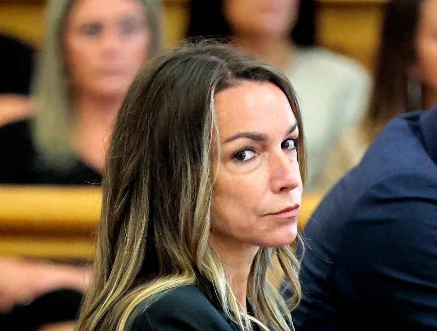 FILE - Karen Read looks toward the jurors, as they are greeted by Judge Beverly J. Cannone during her trial at Norfolk Superior Court in Dedham, Mass., Monday, July 1, 2024. (Pat Greenhouse/The Boston Globe via AP, Pool, file)