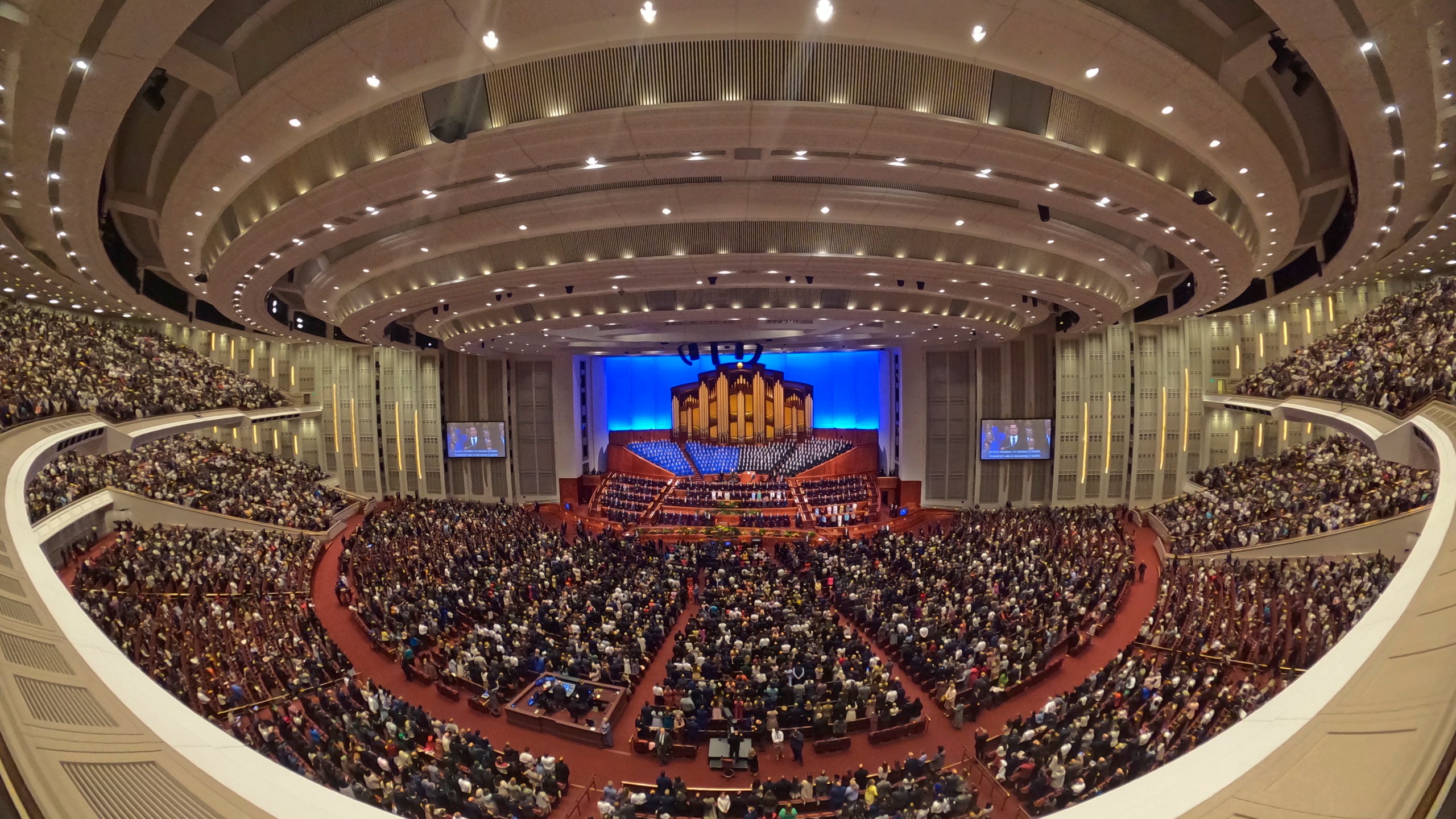 FILE - This image made with a fisheye lens shows people attending the twice-annual conference of the Church of Jesus Christ of Latter-day Saints, on April 7, 2024, in Salt Lake City. (AP Photo/Rick Bowmer, File)