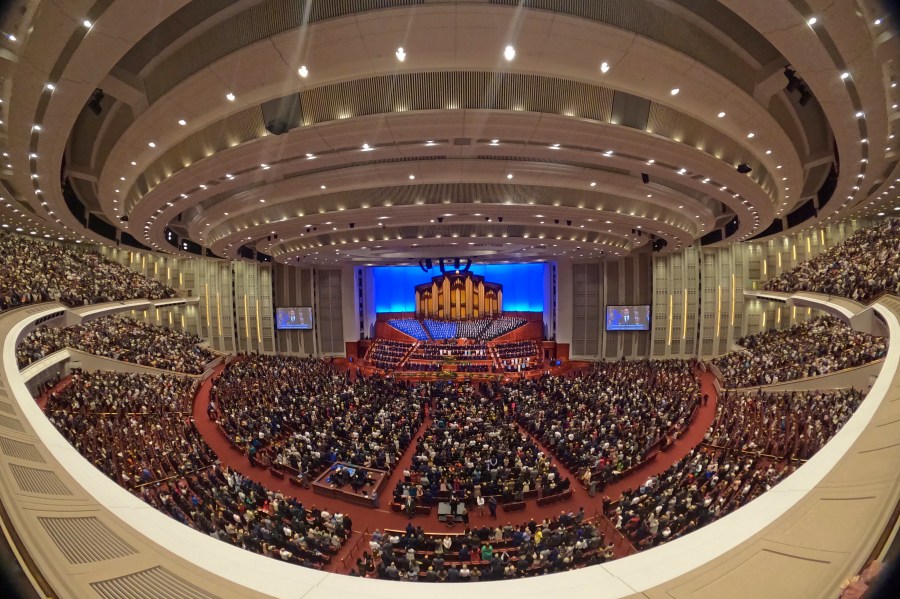 FILE - This image made with a fisheye lens shows people attending the twice-annual conference of the Church of Jesus Christ of Latter-day Saints, on April 7, 2024, in Salt Lake City. (AP Photo/Rick Bowmer, File)