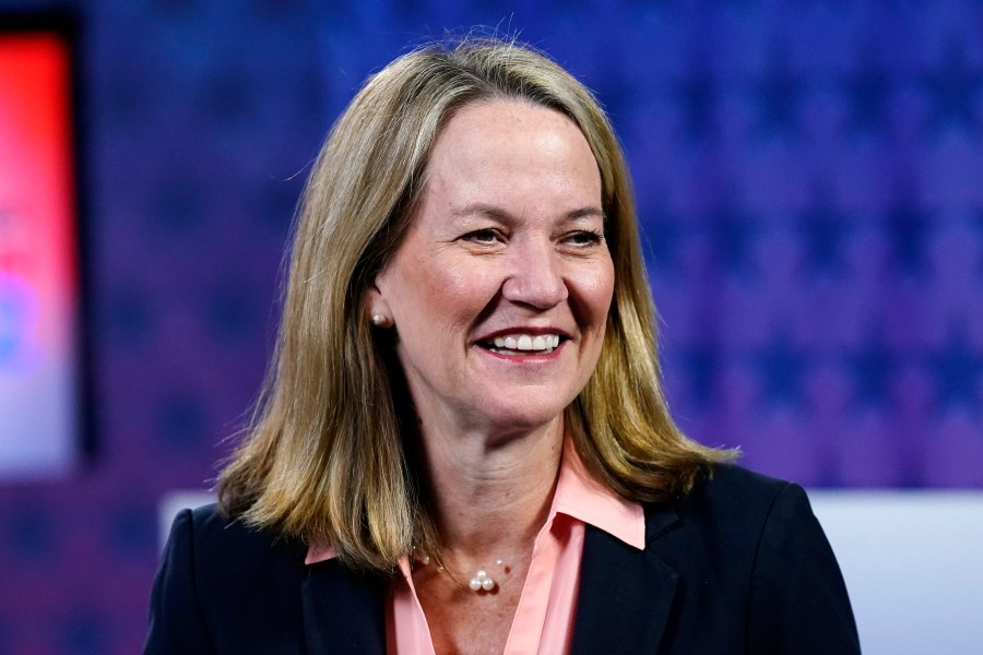 FILE - Kris Mayes smiles before a debate on Sept. 28, 2022, in Phoenix. (AP Photo/Ross D. Franklin, File)