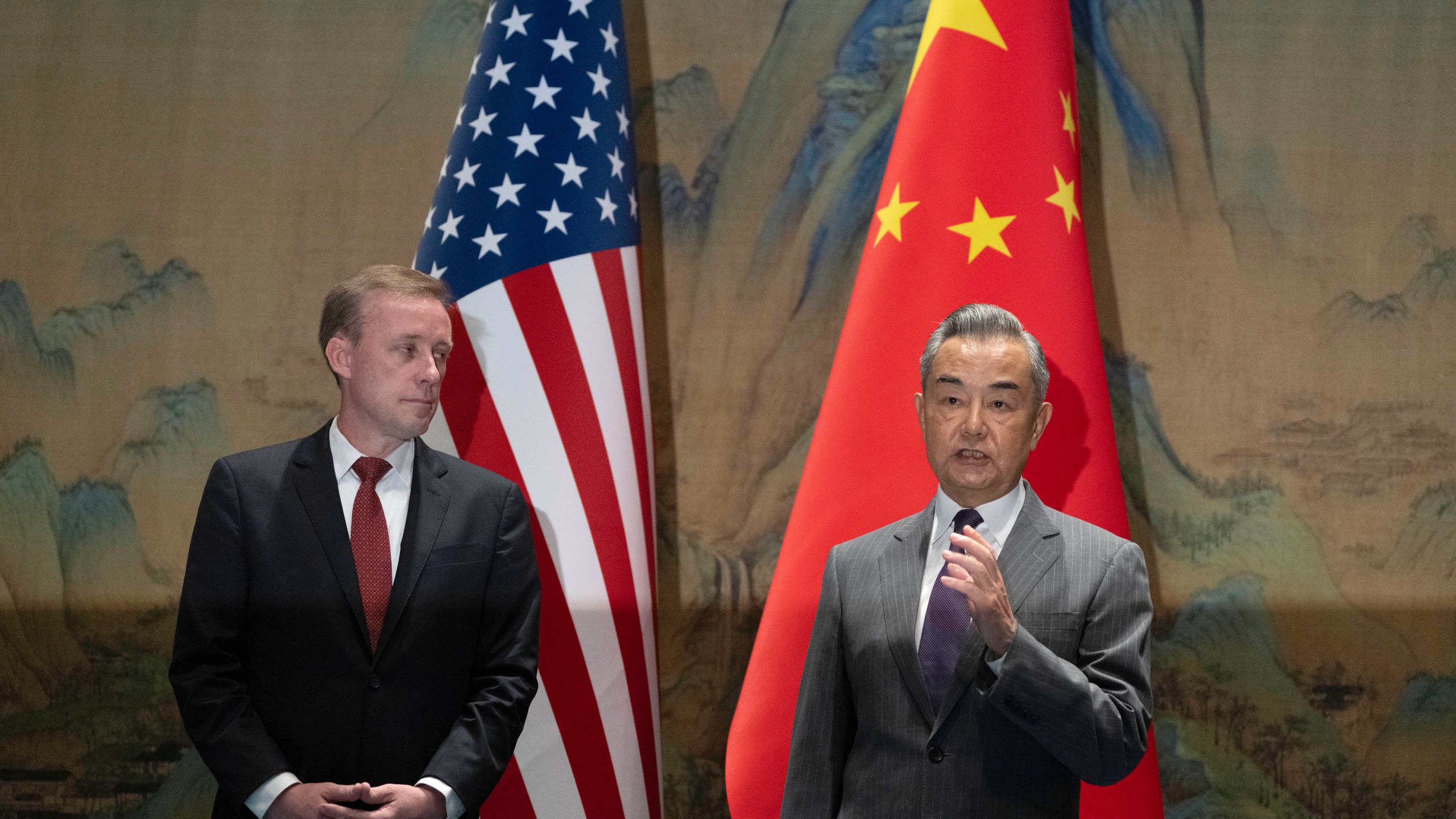 Wang Yi, right, the director of the Communist Party's Central Foreign Affairs Commission Office speaks as White House national security adviser Jake Sullivan, left, listens to Wang, before their talk at Yanqi lake in Beijing, Tuesday, Aug. 27, 2024. (AP Photo/Ng Han Guan, Pool)