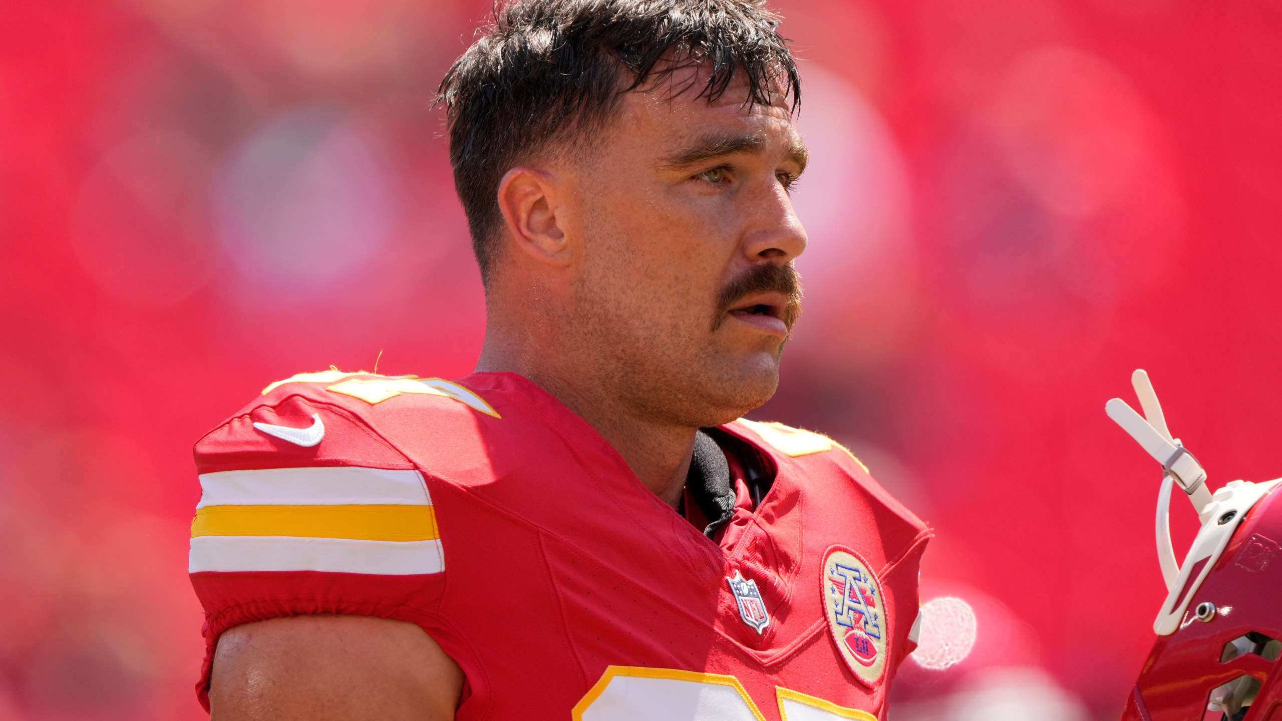 Kansas City Chiefs tight end Travis Kelce (87) warms up before an NFL preseason football game against the Detroit Lions Saturday, Aug. 17, 2024, in Kansas City, Mo. (AP Photo/Charlie Riedel)