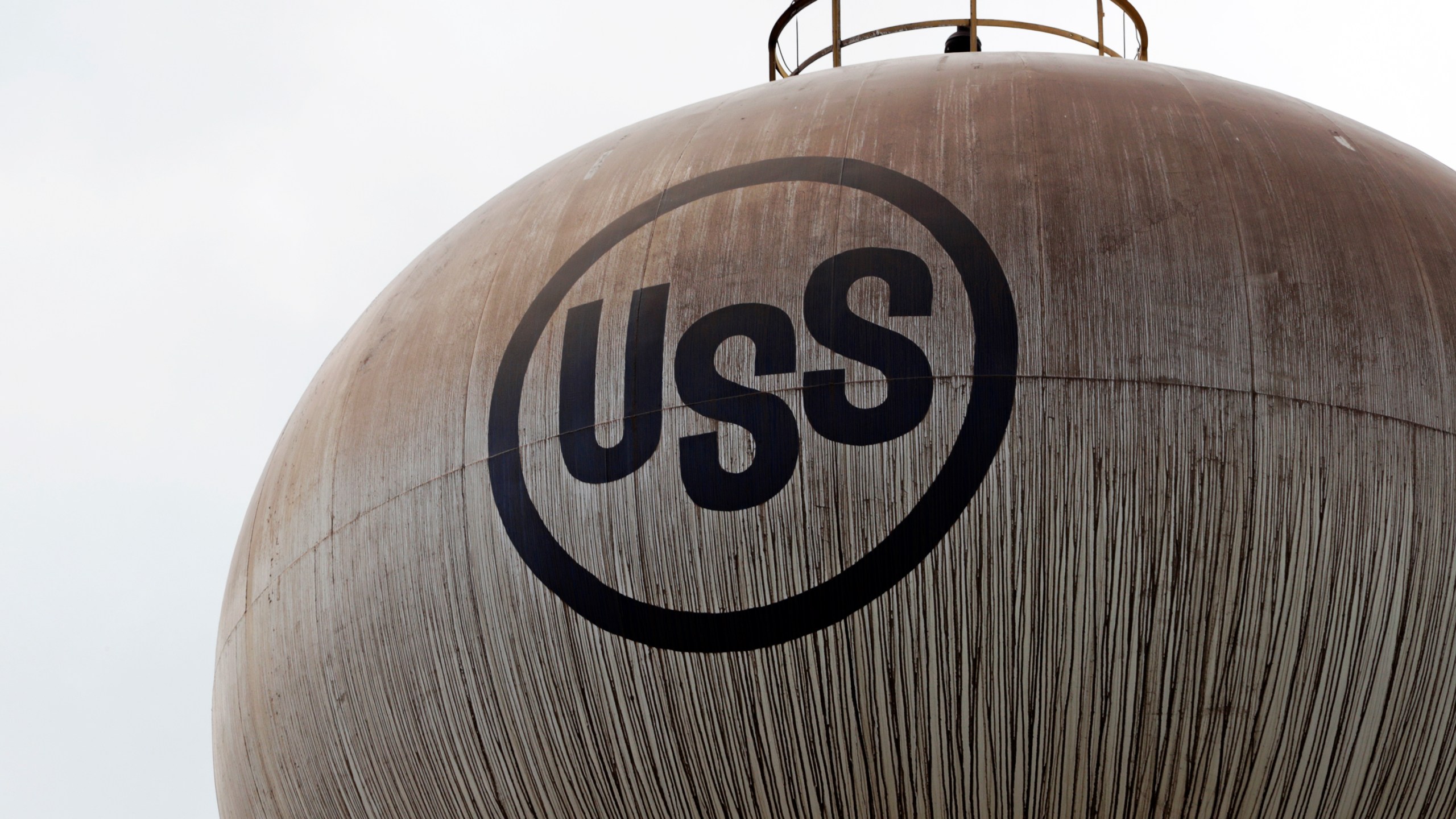 FILE - A U.S. Steel logo is seen on a water tower, May 2, 2019, at U.S. Steel's Edgar Thomson Works in Braddock, Pa. (AP Photo/Gene J. Puskar, File)