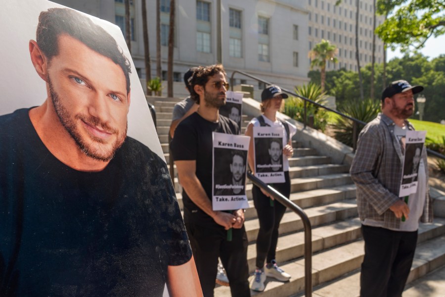 Friends and supporters of late actor Johnny Wactor, pictured left, hold a news conference to demand justice for the former "General Hospital" actor during a news conference outside Los Angeles City Hall in Los Angeles Tuesday, Aug.13, 2024. (AP Photo/Damian Dovarganes)