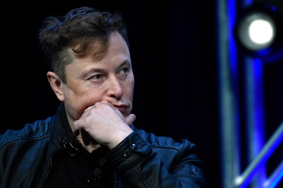 Elon Musk listens to a question as he speaks at the SATELLITE Conference and Exhibition in Washington, March 9, 2020.